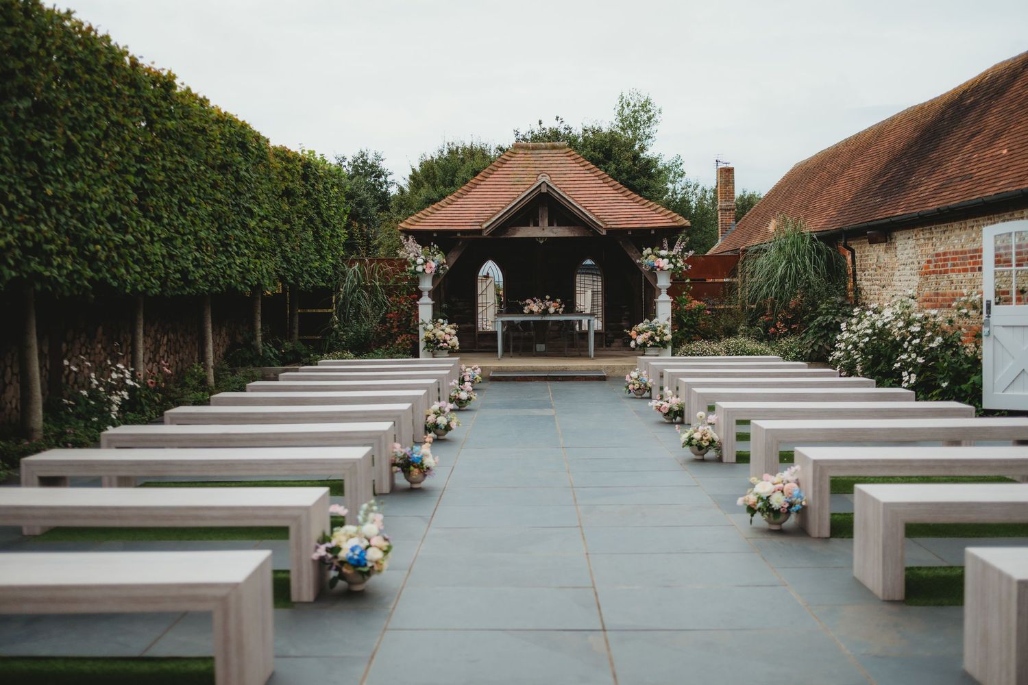 southend barns wedding photographers. secret garden ceremony area
