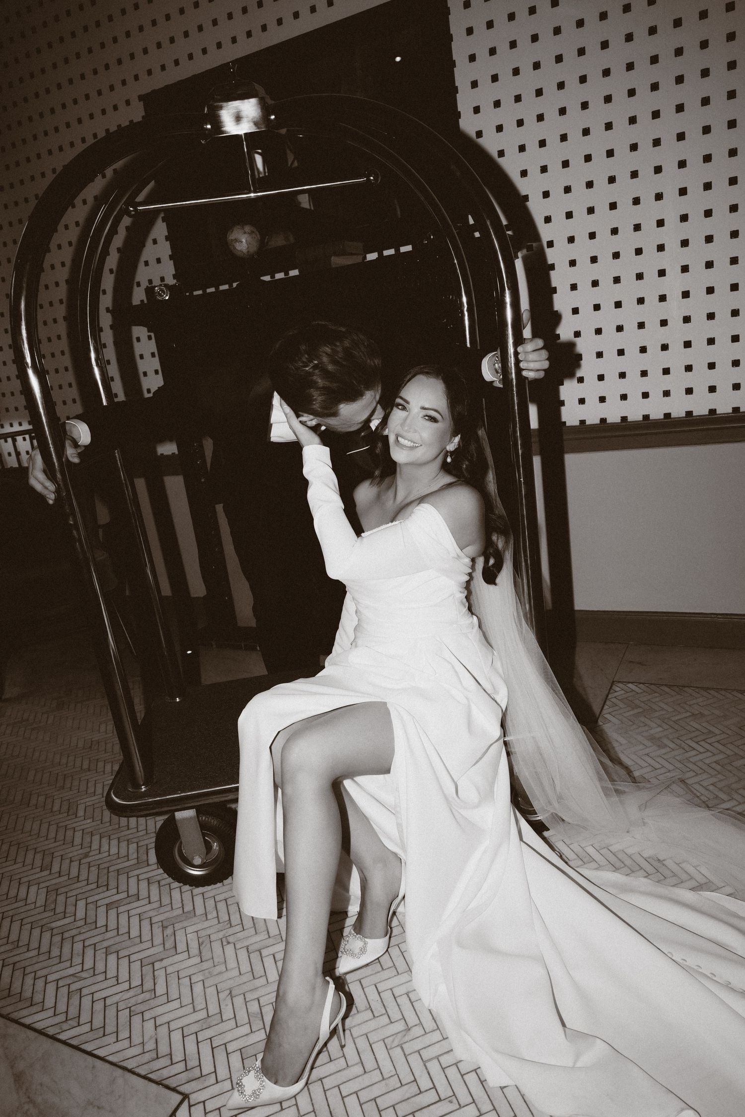 A sequence of black and white photos showing someone in a white dress getting into a car at night.