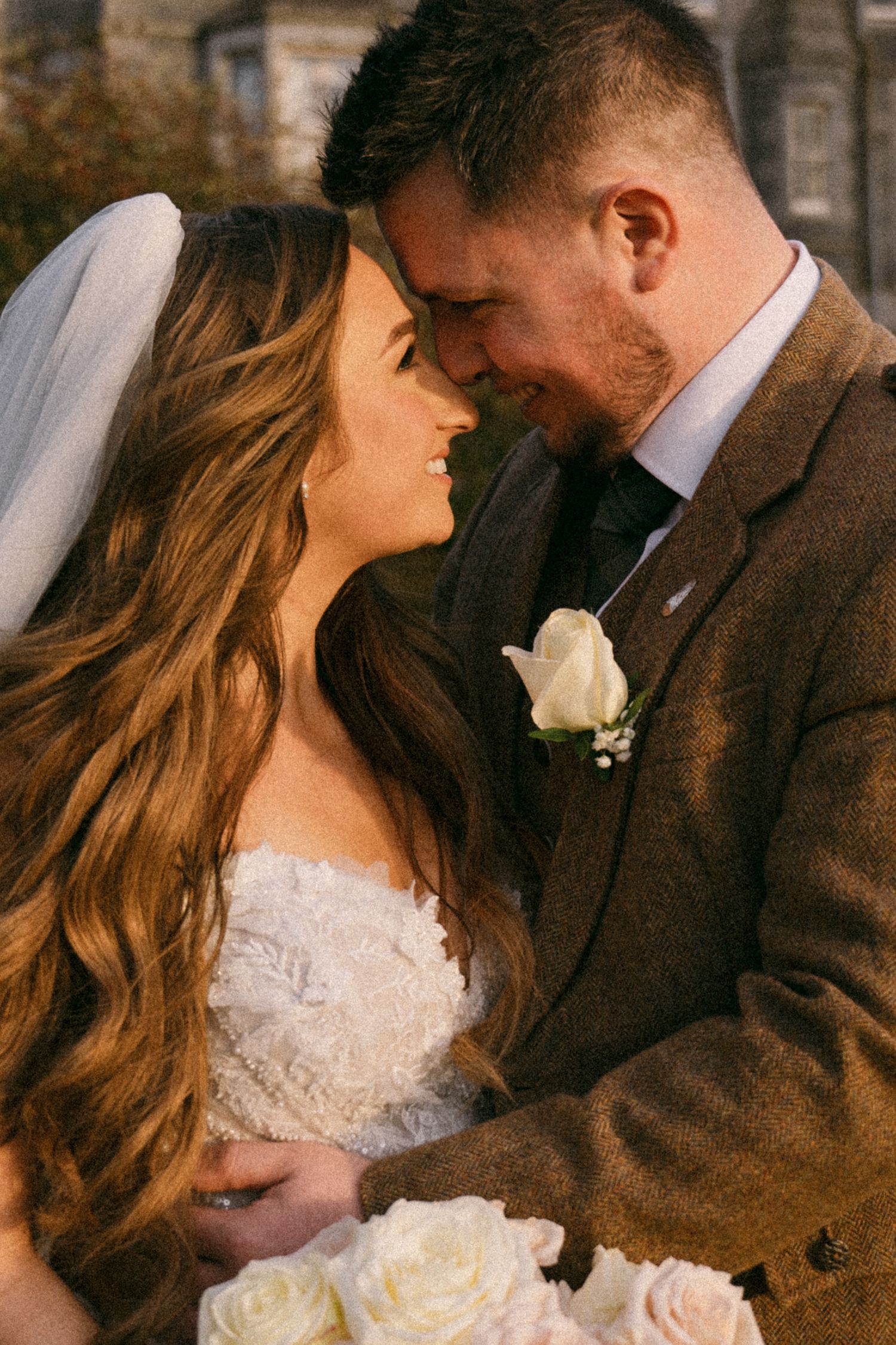Intimate close-up portrait of a couple sharing a romantic moment on their wedding day.  Aberdeen wedding photographer, ardoe house