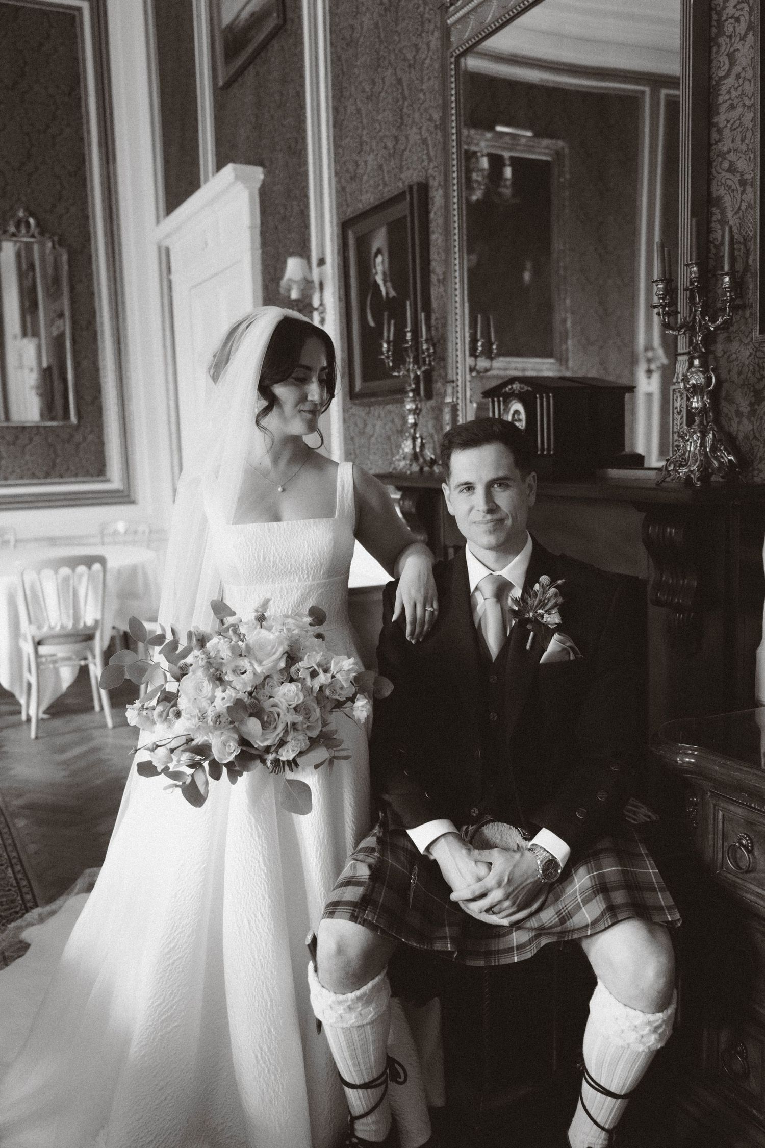 Collage of vintage black and white wedding photographs showing a couple at various moments during a formal ceremony.