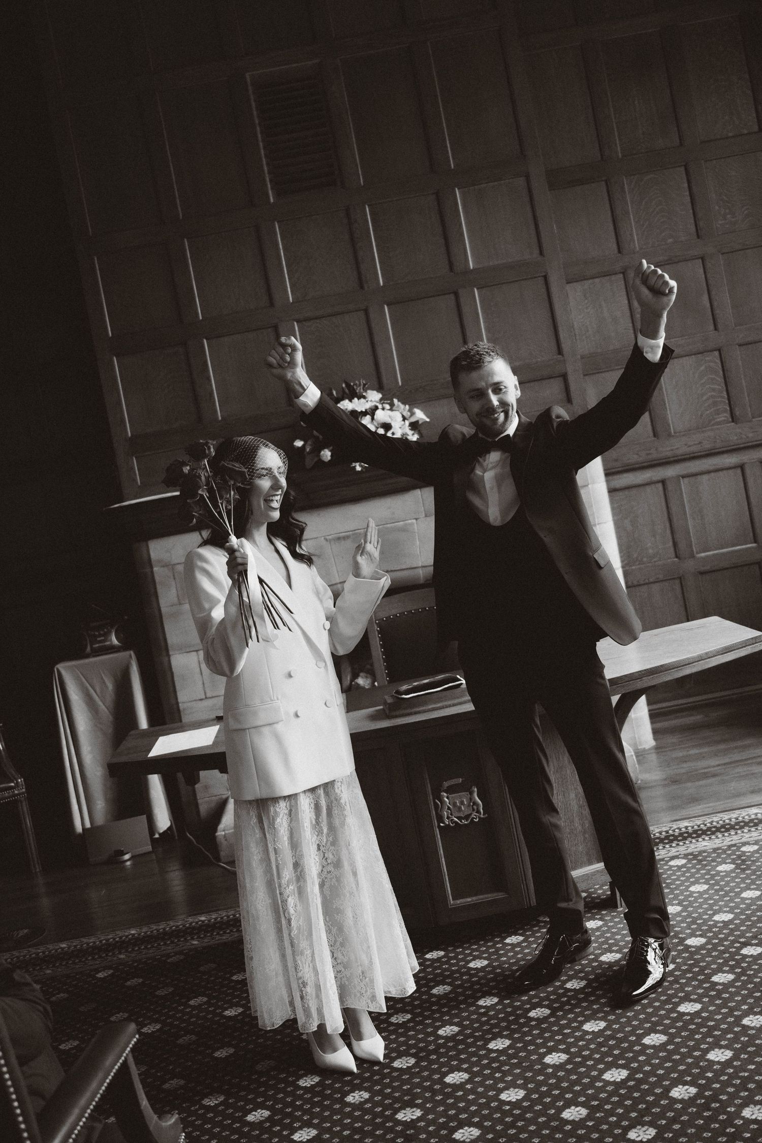 Three black and white vintage photographs showing people dancing and celebrating in what appears to be a grand hall.