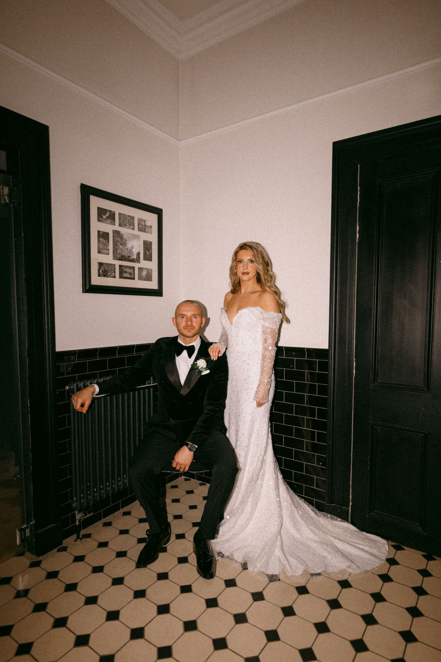 Elegant wedding portrait on vintage tiled floor featuring formal attire and classic decor.  Aberdeen wedding photographer, meldrum house