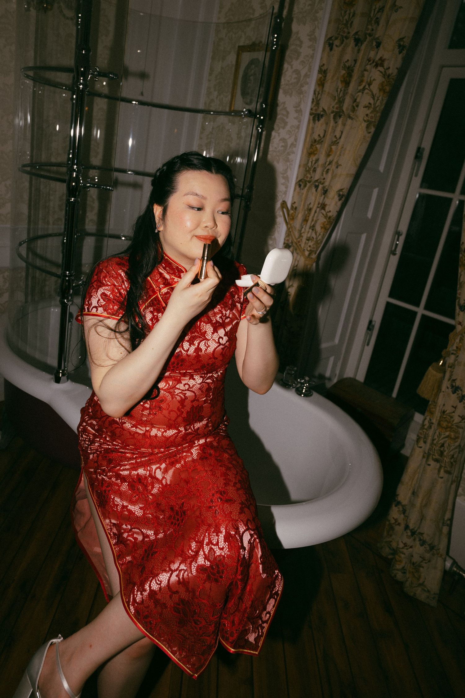 Bride getting ready for her traditional Chinese Tea Ceremony at Drumtochty Castle. Scottish Wedding Photography Aberdeen