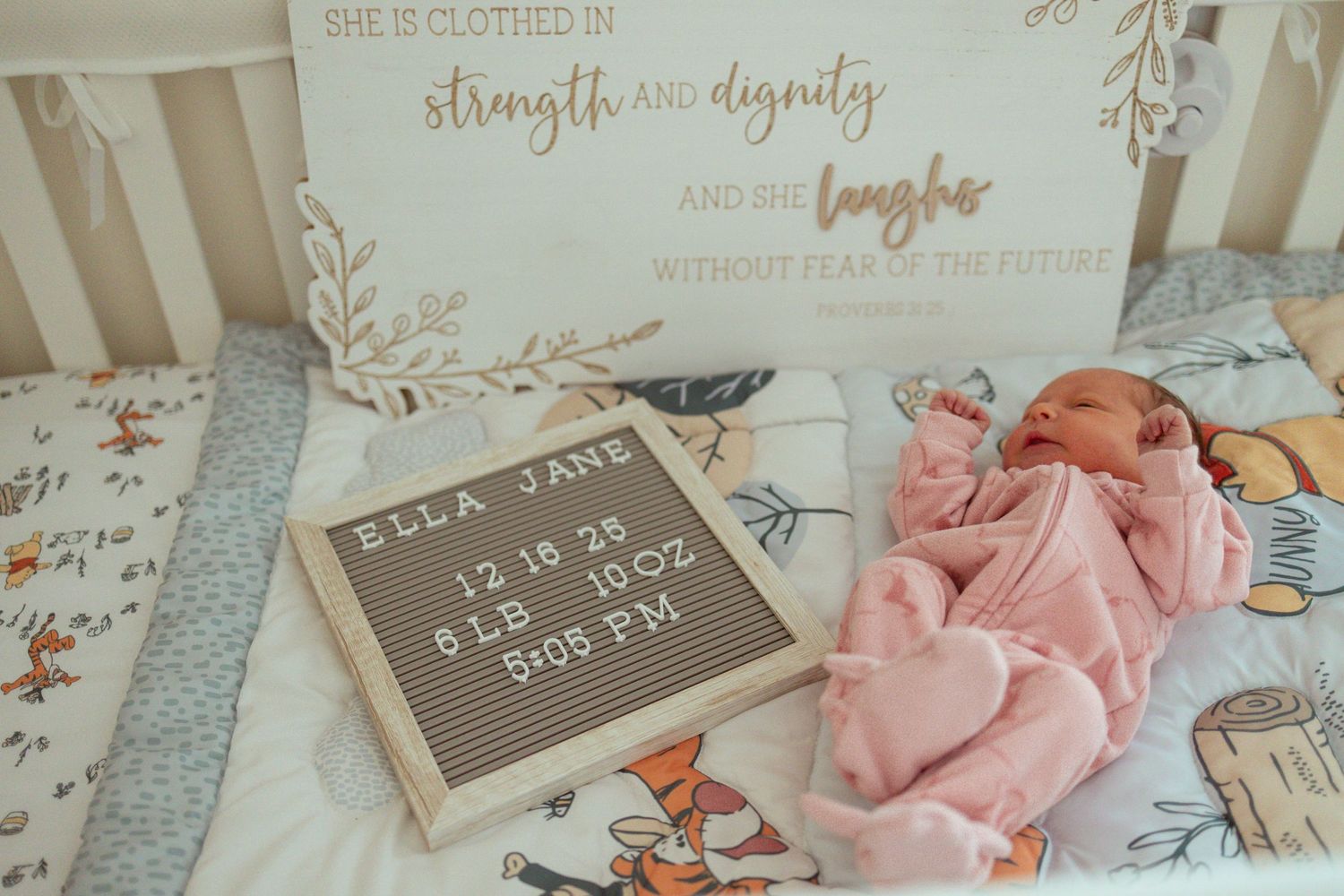 Decorative pink roses and chalkboard signs create a romantic shabby chic wedding decor arrangement.