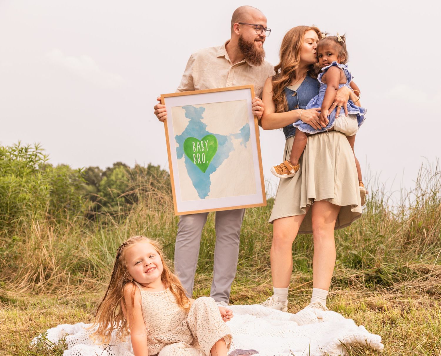 A series of heartwarming outdoor family photos showing parents and kids looking at maps and exploring nature together.