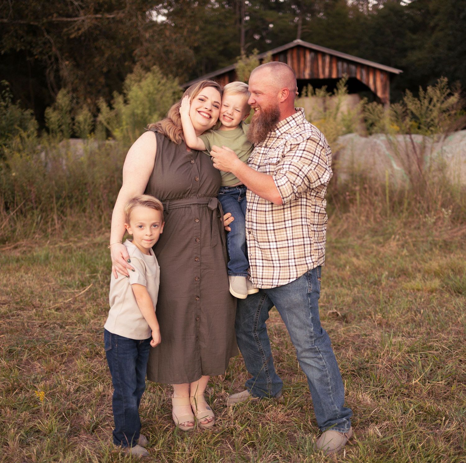 A collection of casual outdoor family portraits taken in a rustic field setting at sunset.