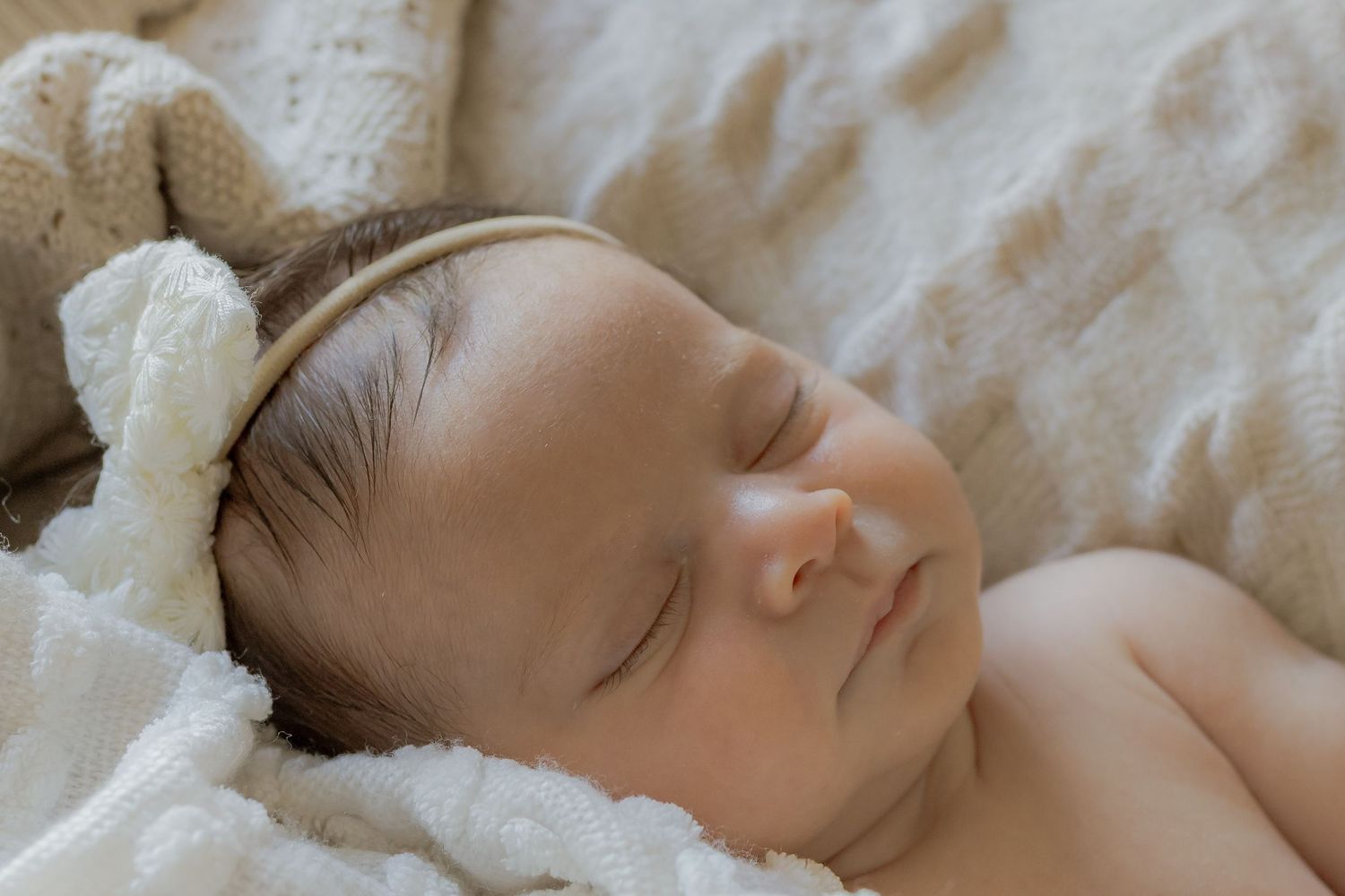 Newborn sitting in soft blankets Newborn Photography Session Point Cook