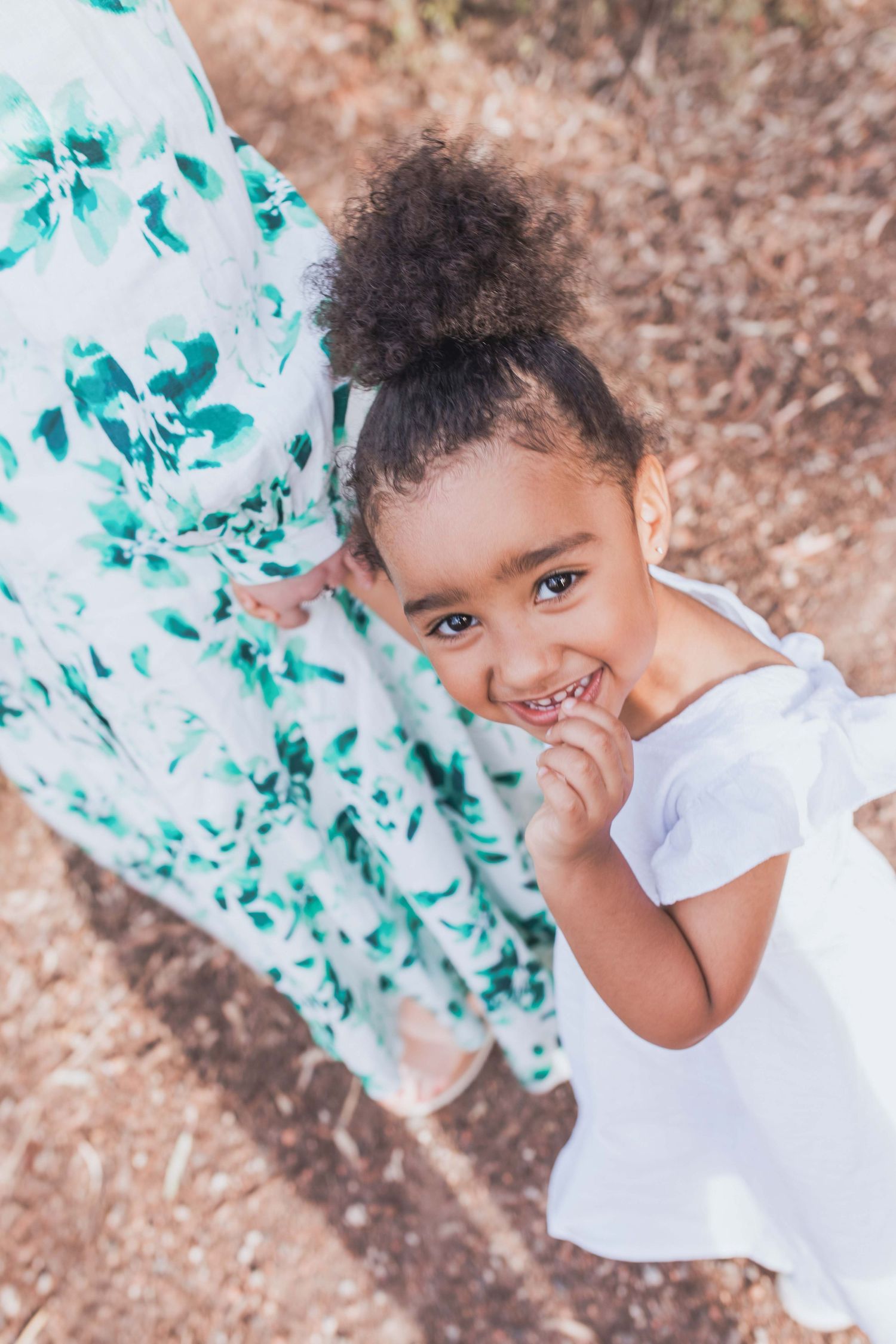 Daughter holding mums hand outdoor family session, Newport Lakes Melb Vic