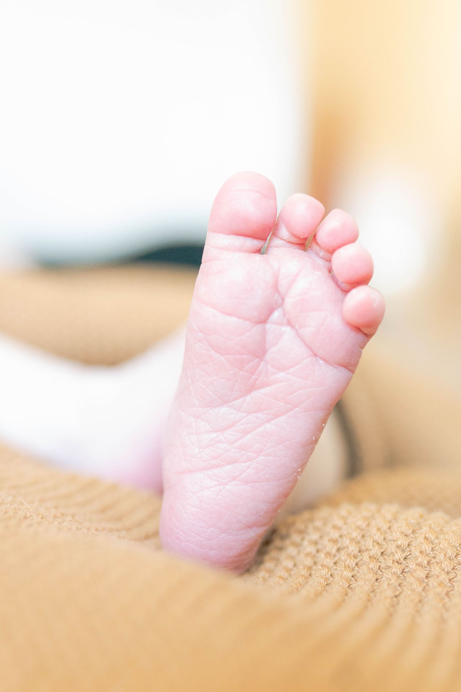 Newborn's foot with tiny toes