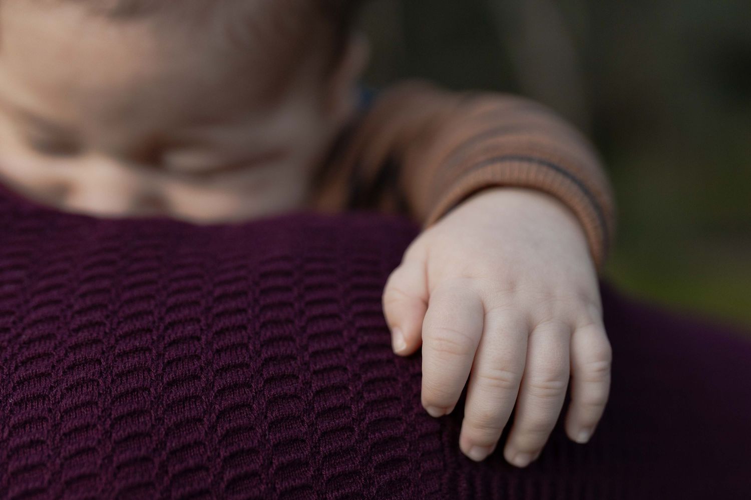 Newborn baby boy sleeping on his dad's should, tiny little hand leaning over, Newborn family shoot Sunshine North Melbourne, Victoria