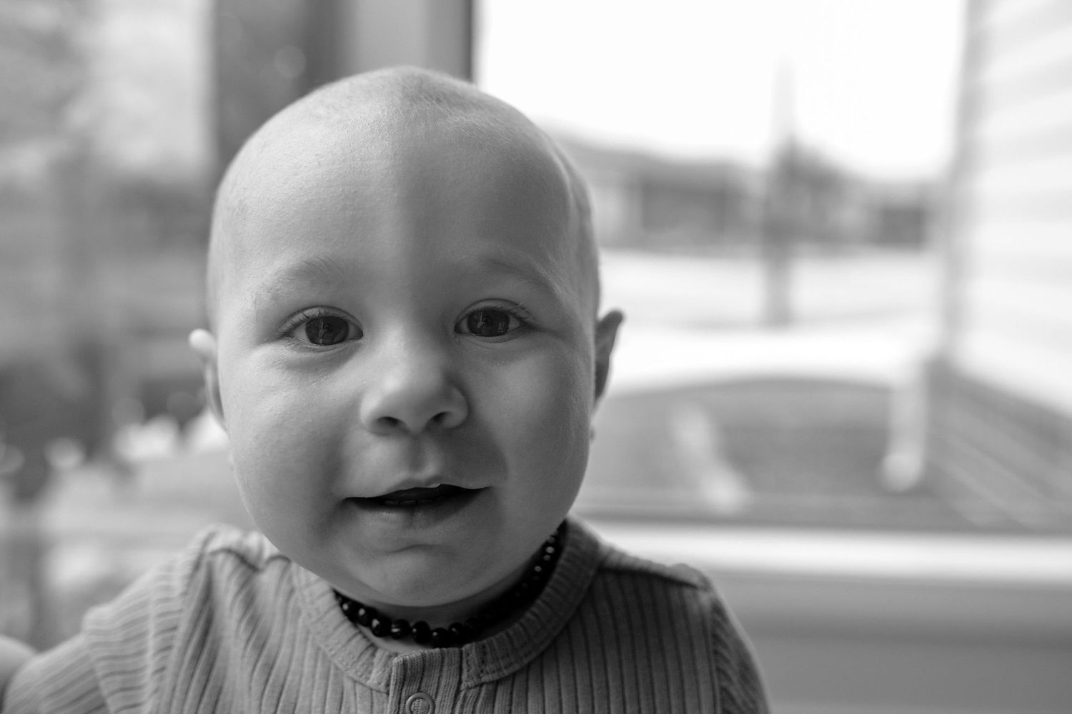 Close up of toddlers face smiling at home family newborn session. Taylors Hill Melb Vic