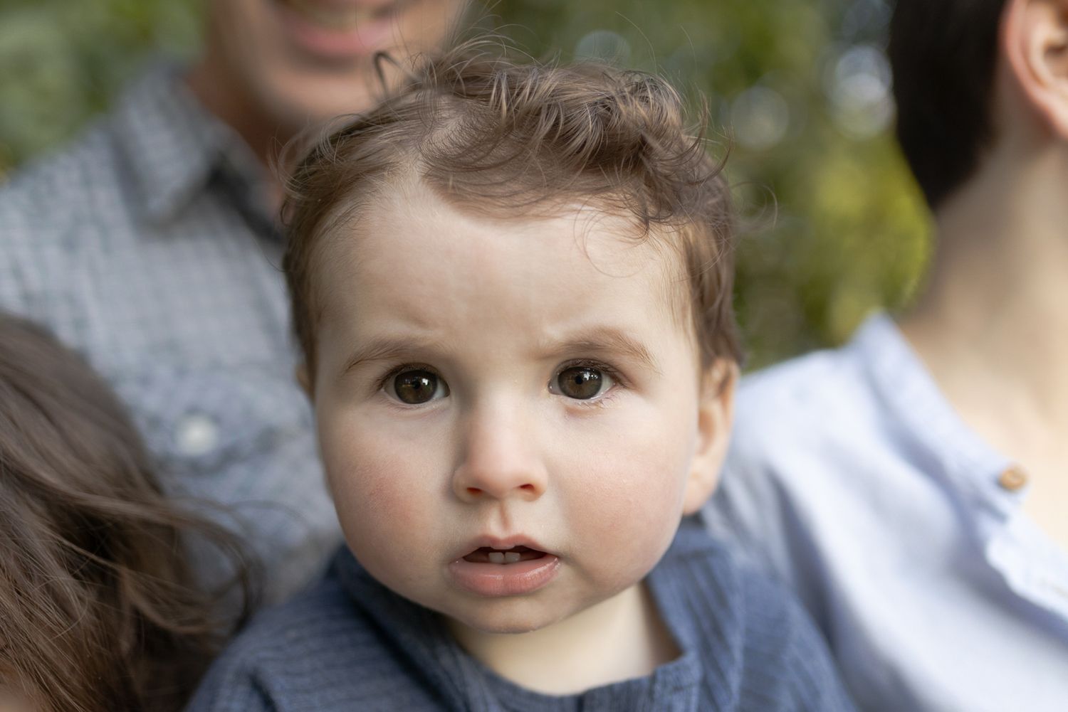Toddler looking into the camera intensely Outdoor at home family Woodend, Melbourne, Victoria