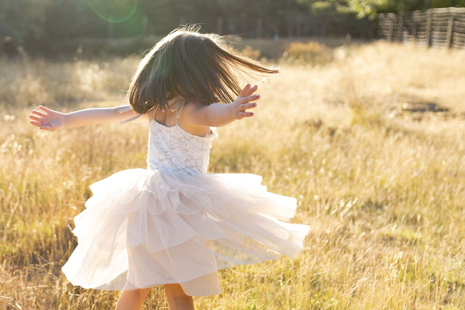 Little girl dancing Outdoor at home family session Gisborne Melb Vic