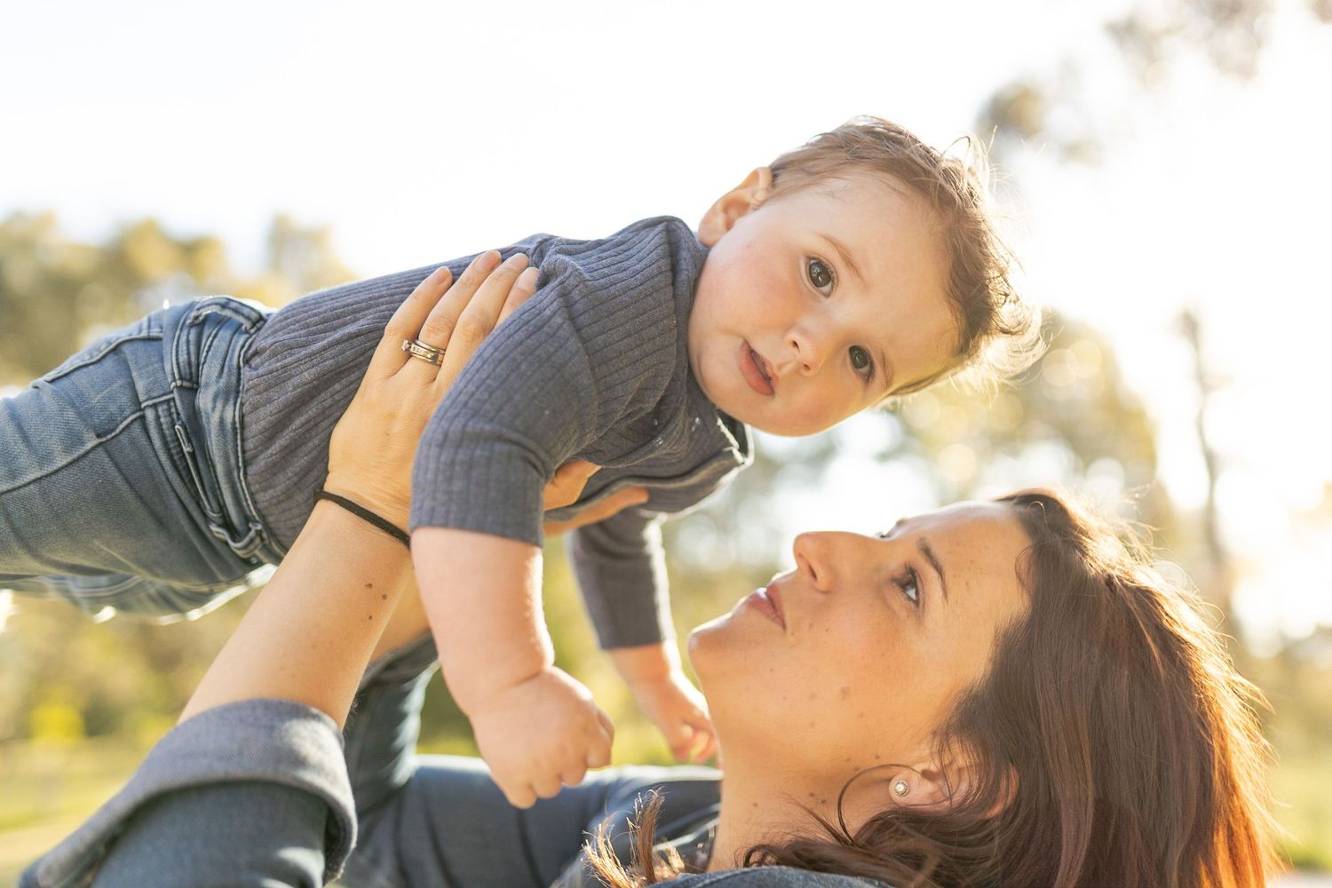 Mum holding her son up in the air Outdoor at home family Woodend, Melbourne, Victoria