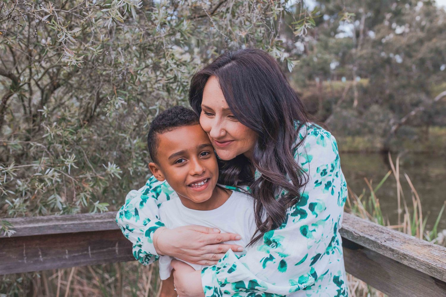 Mother and son hugging feeling the love, outdoor family session  Newport Lakes Melb Vic