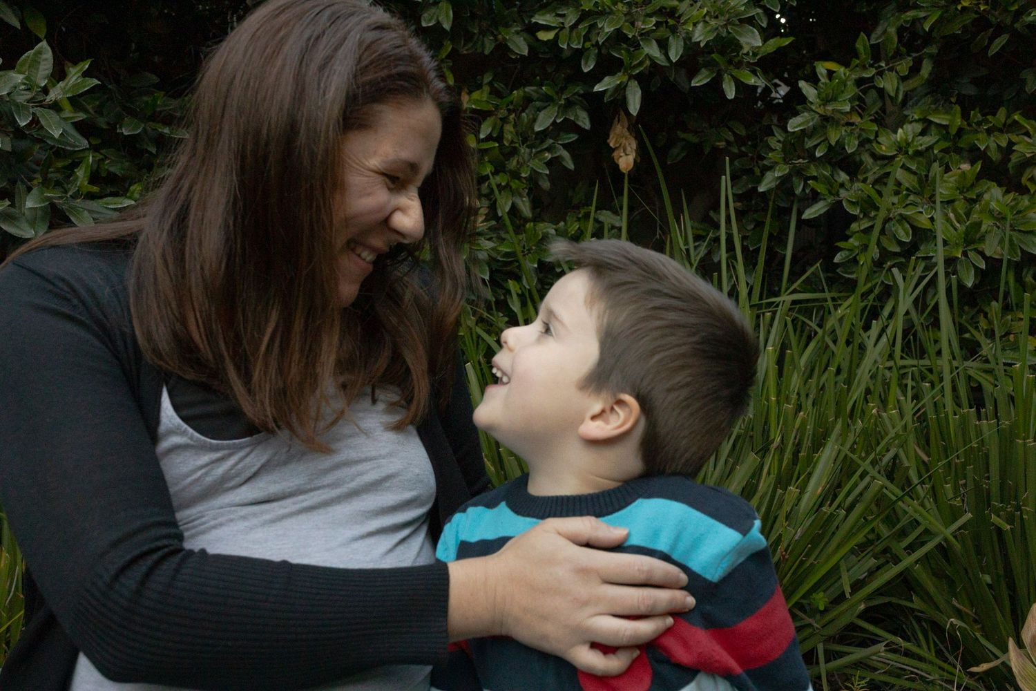 Mum and son laughing and smiling to each other at home maternity session Moonee Ponds  Melb Vic