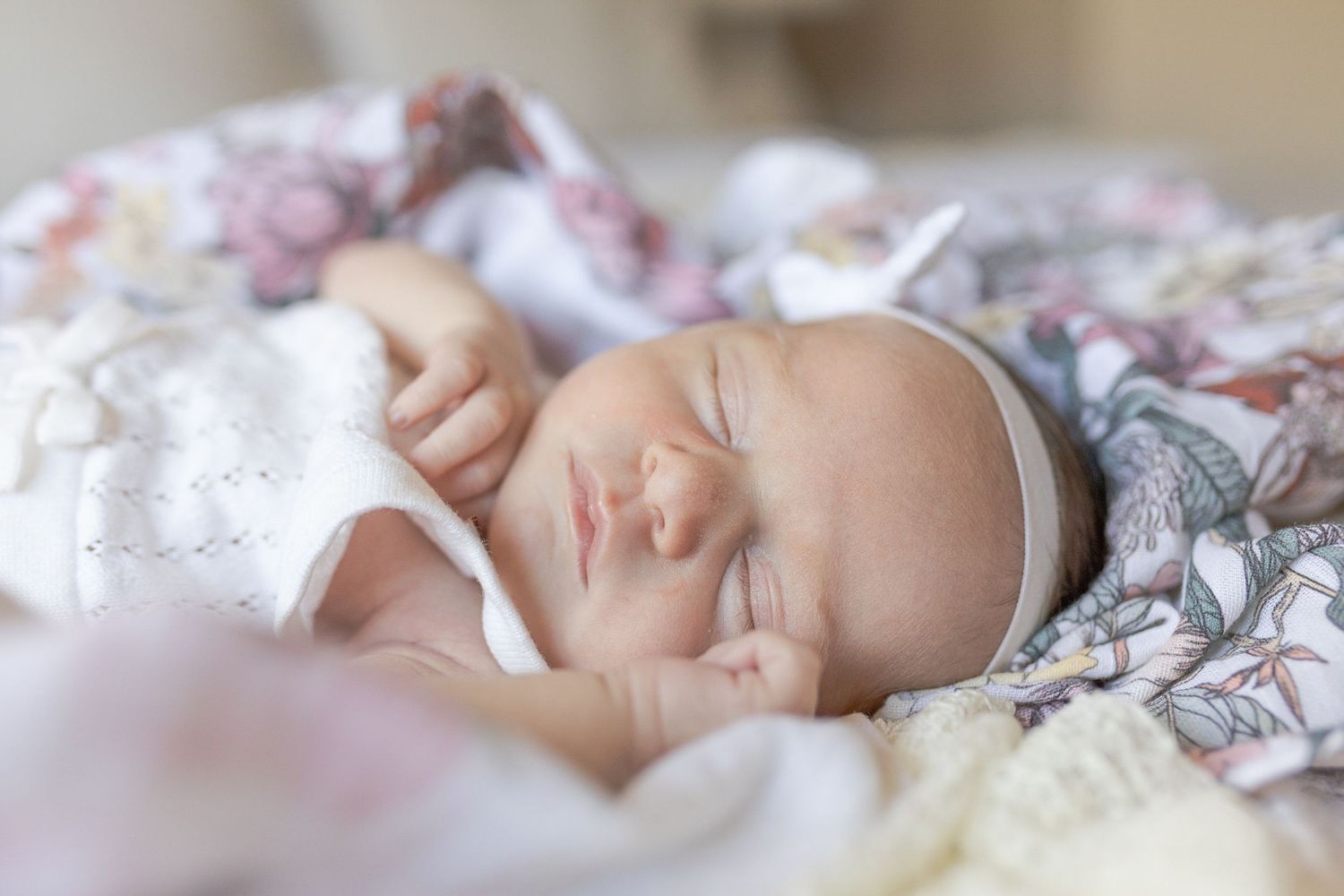 Newborn baby girl sleeping blissfully, Caroline Springs, Melbourne Victoria