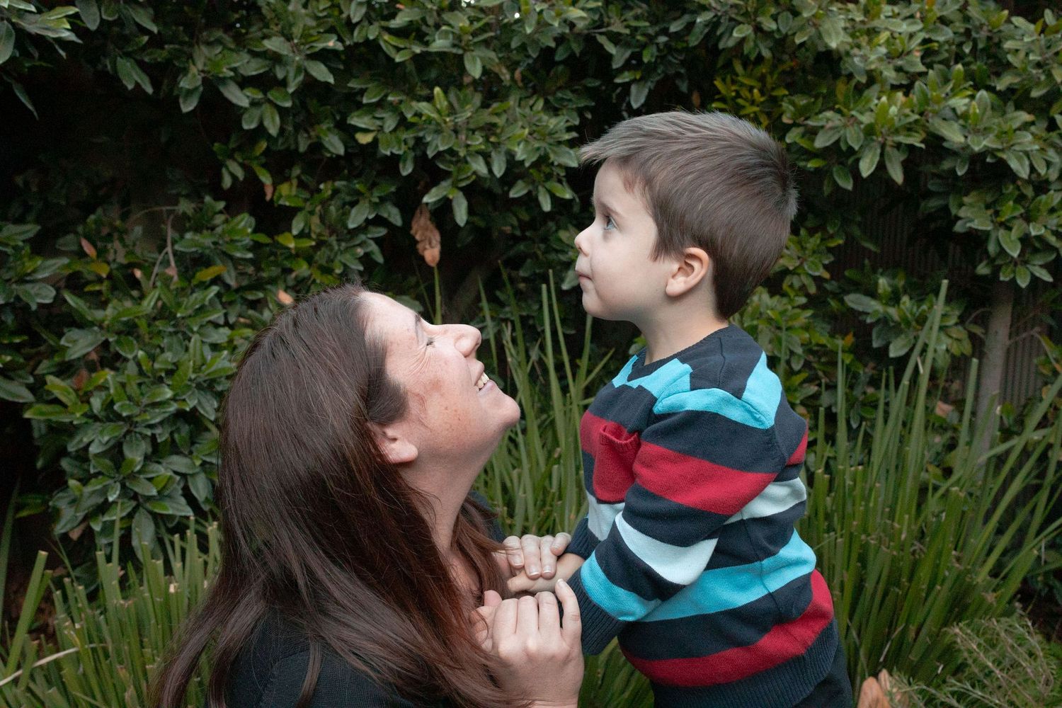 Mum and son laughing and smiling to each other at home maternity session Moonee Ponds  Melb Vic