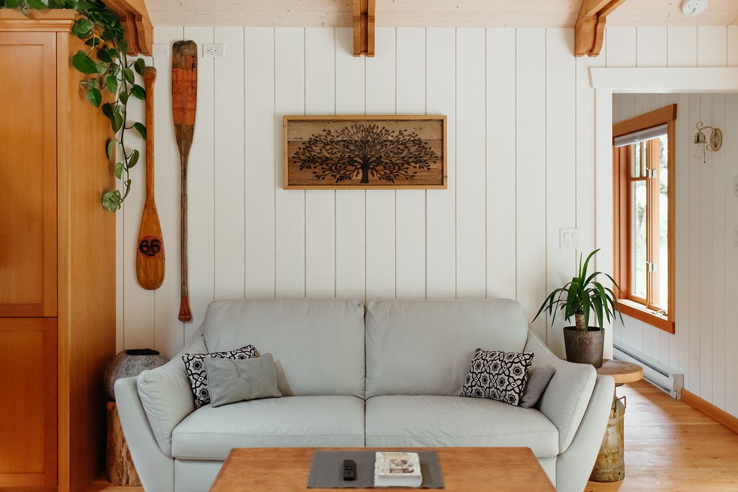 wild plum cottage living room, coffee table and leather couch