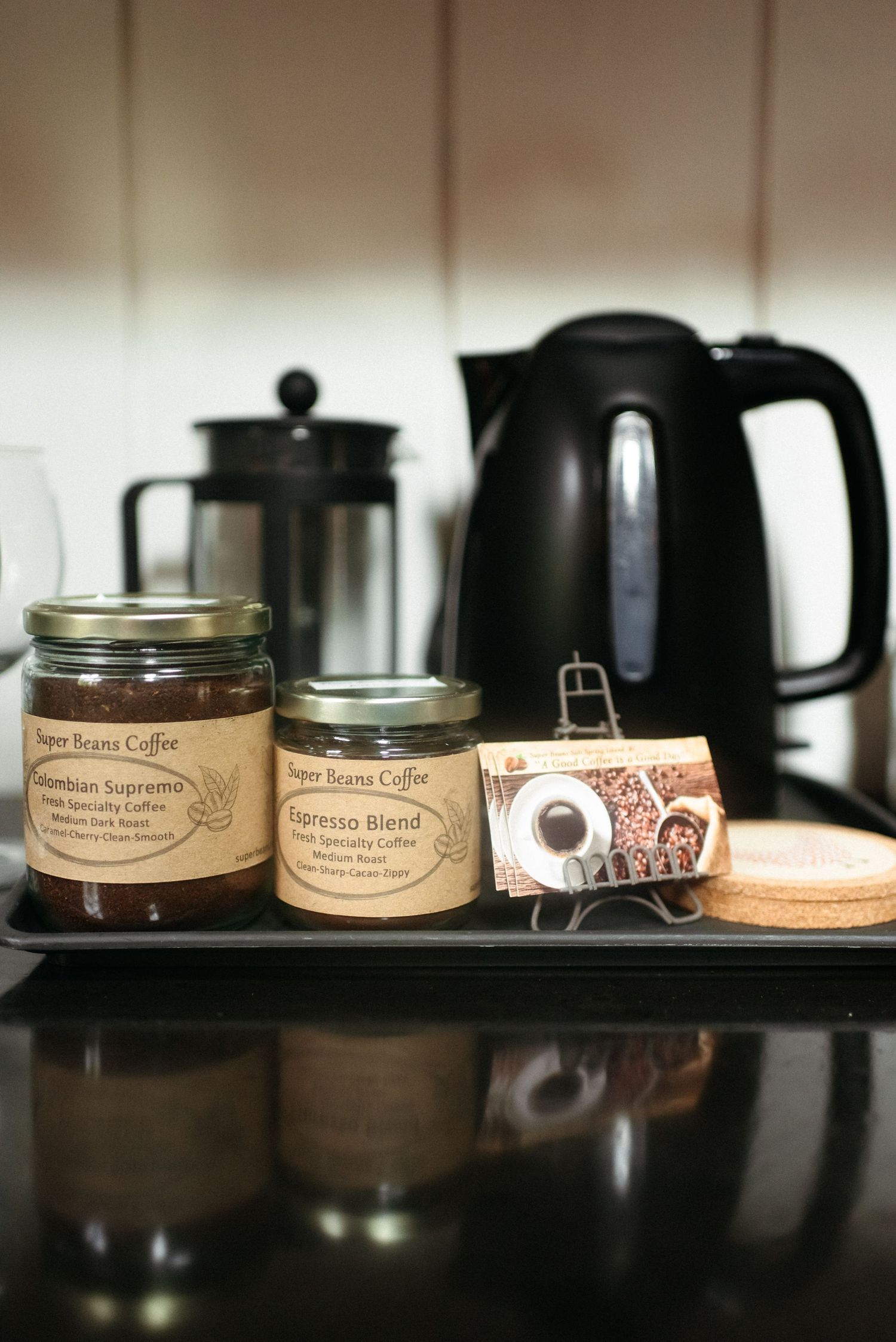 sacred arrow estates home grown coffee beans and french press machine