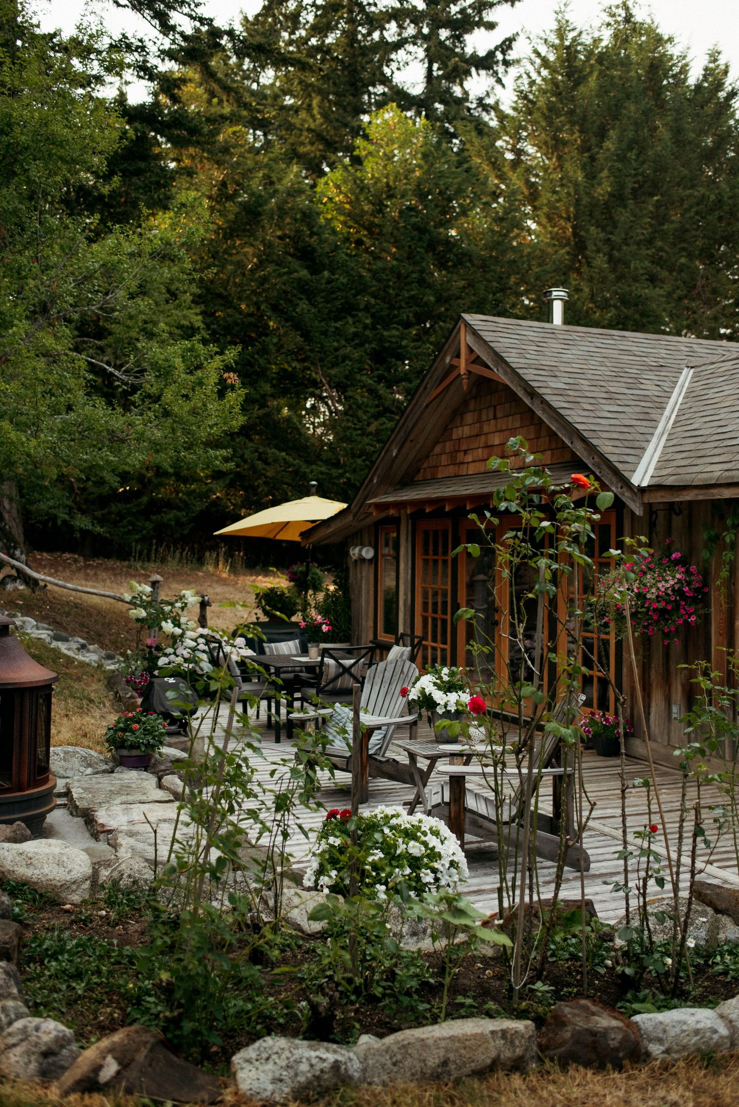 back deck and back doors of the wild plum cottage on salt spring island