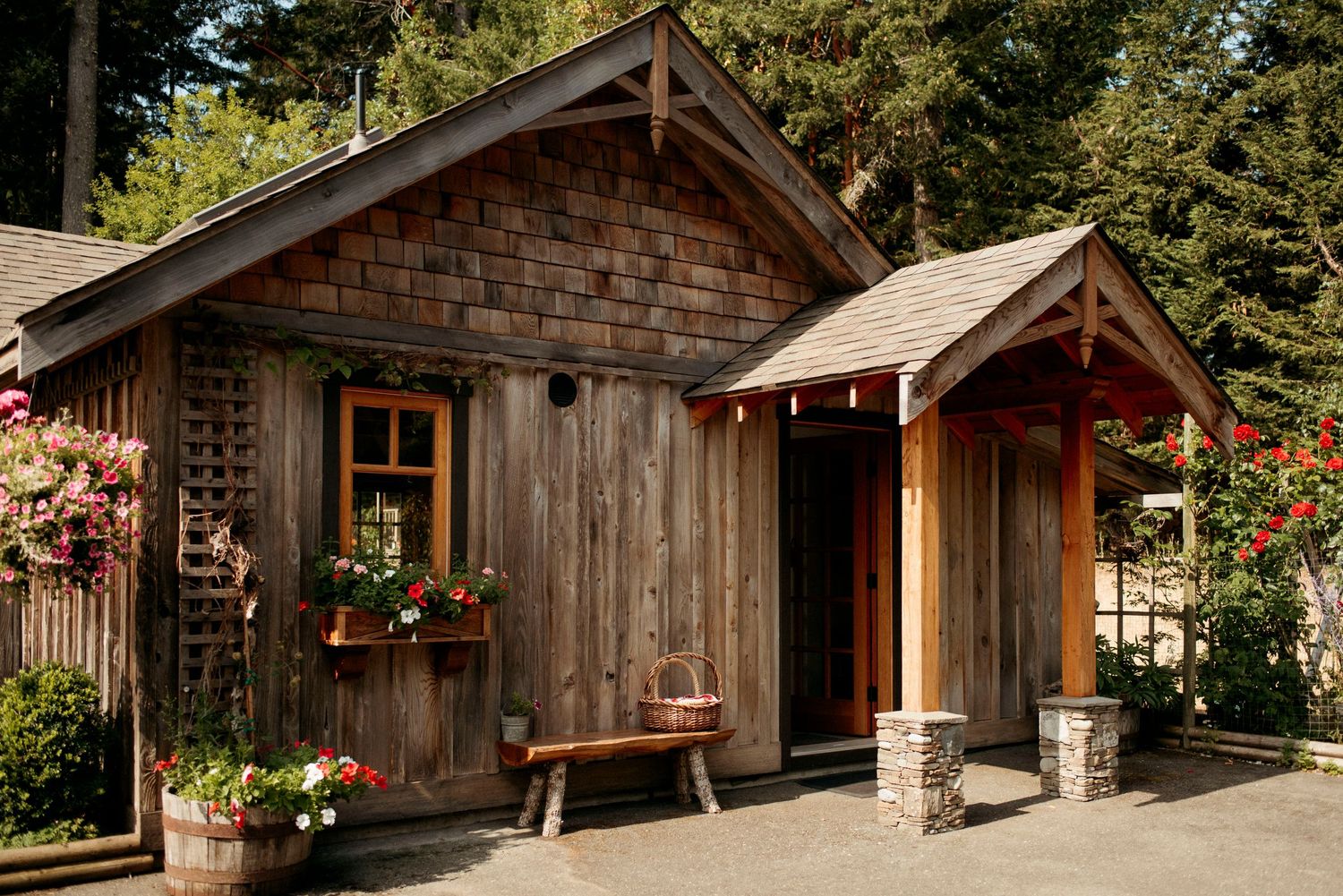 the front of wild plum cottage with vibrant gardren boxes
