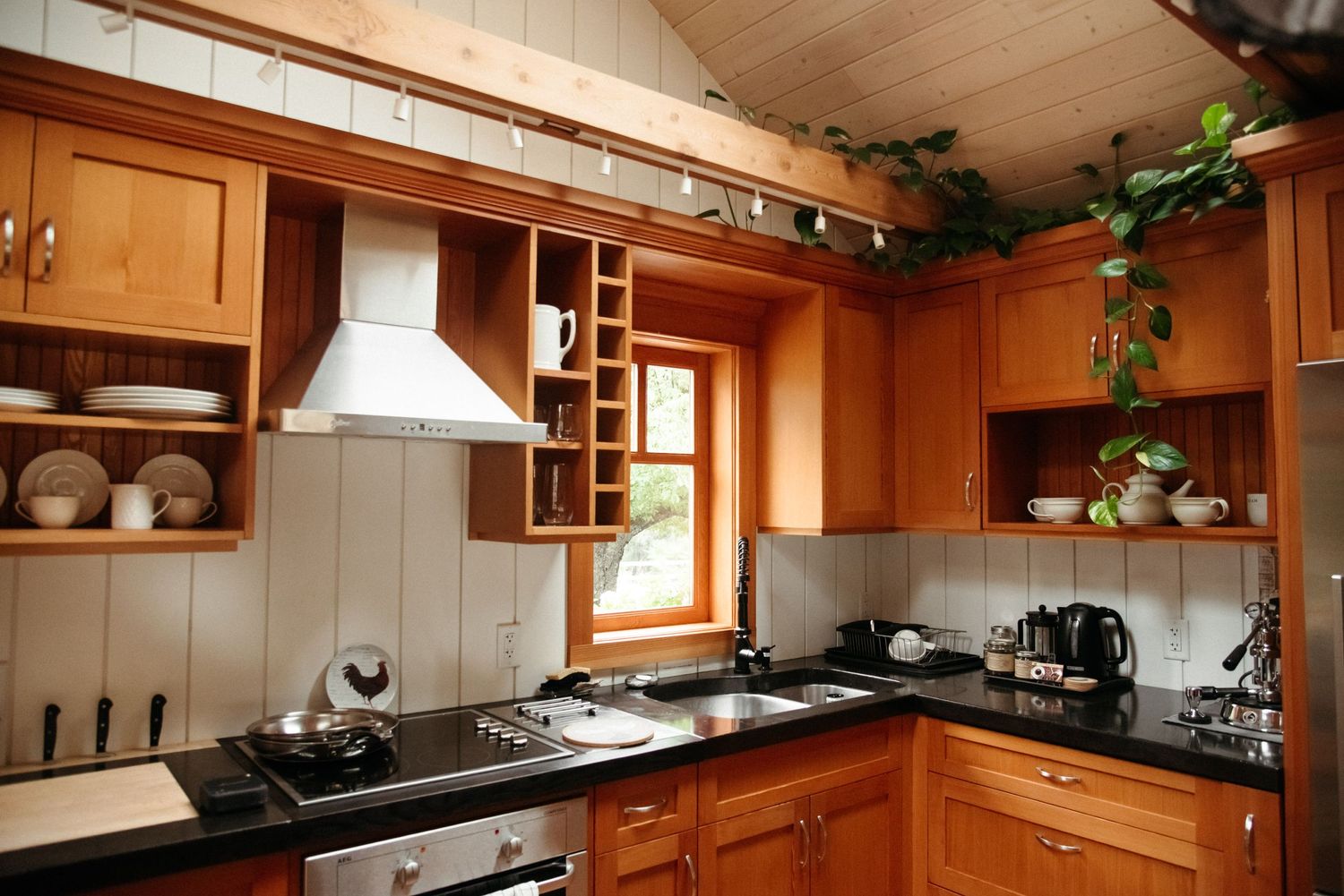 warm wood, farm style kitchen inside the wild plum cottage at sacred arrow estates