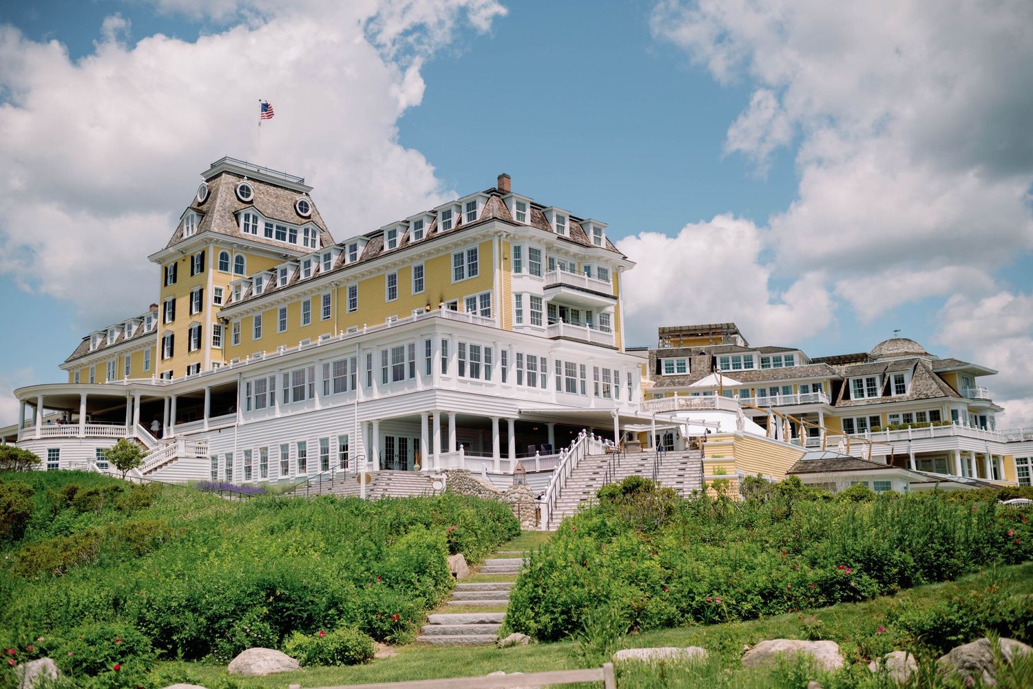 Historic Ocean House hotel sits majestically on a grassy hillside overlooking the Atlantic in Watch Hill, Rhode Island.