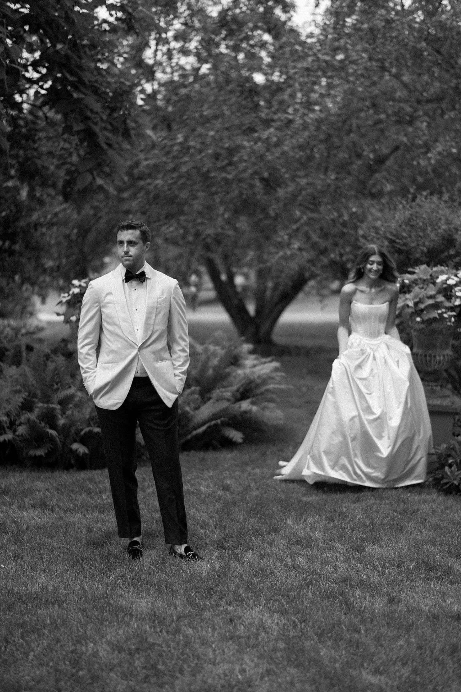 A black and white photo series showing a couple in formal attire posing separately in a garden setting.