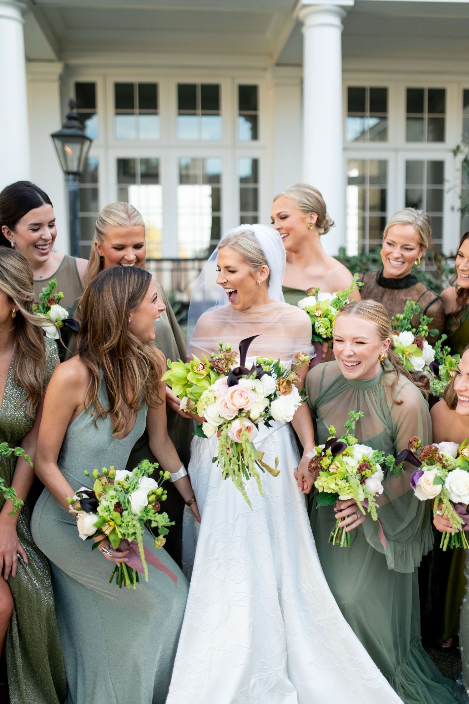 Candid shots of wedding party laughing together on building's front porch.