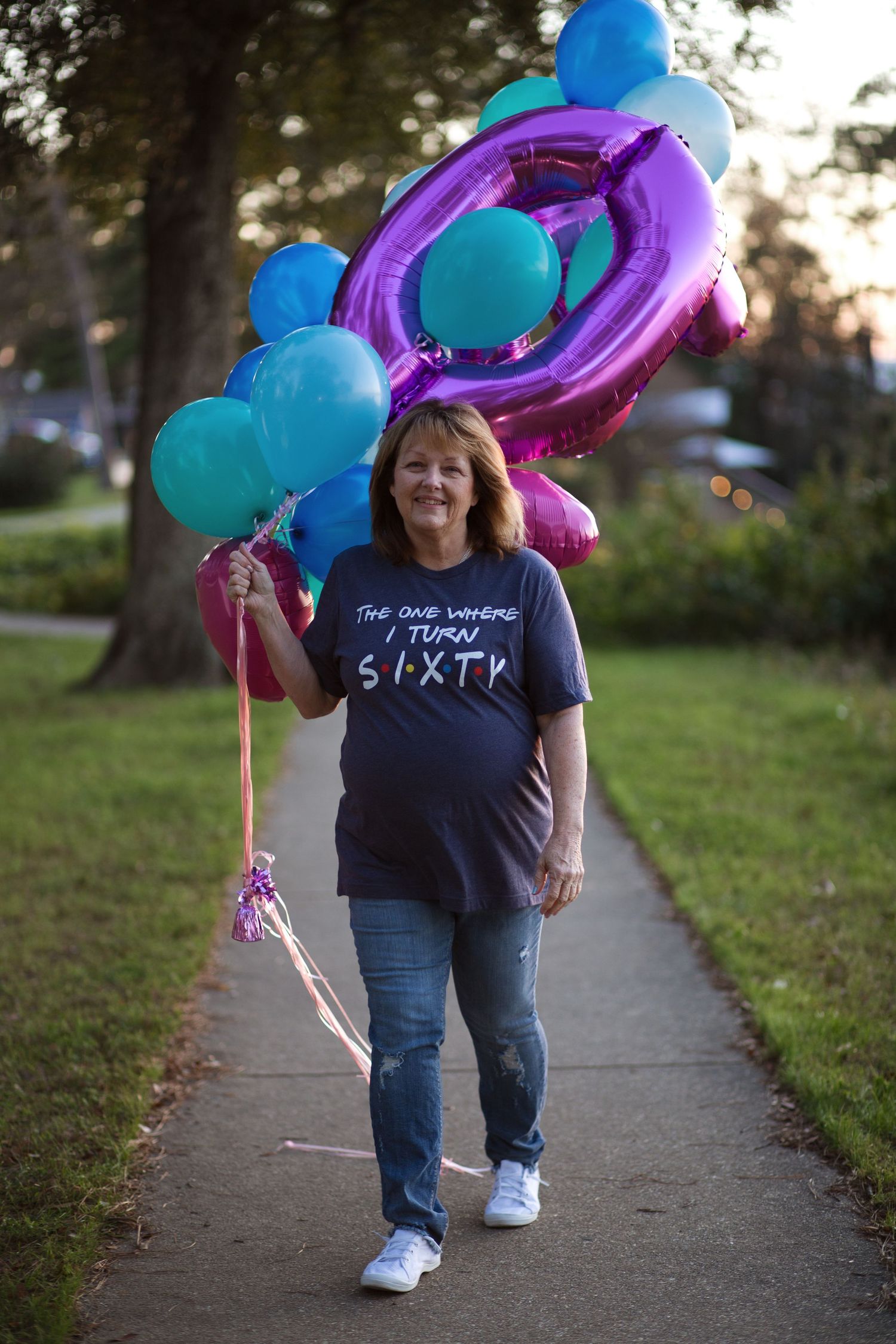 woman with birthday balloons