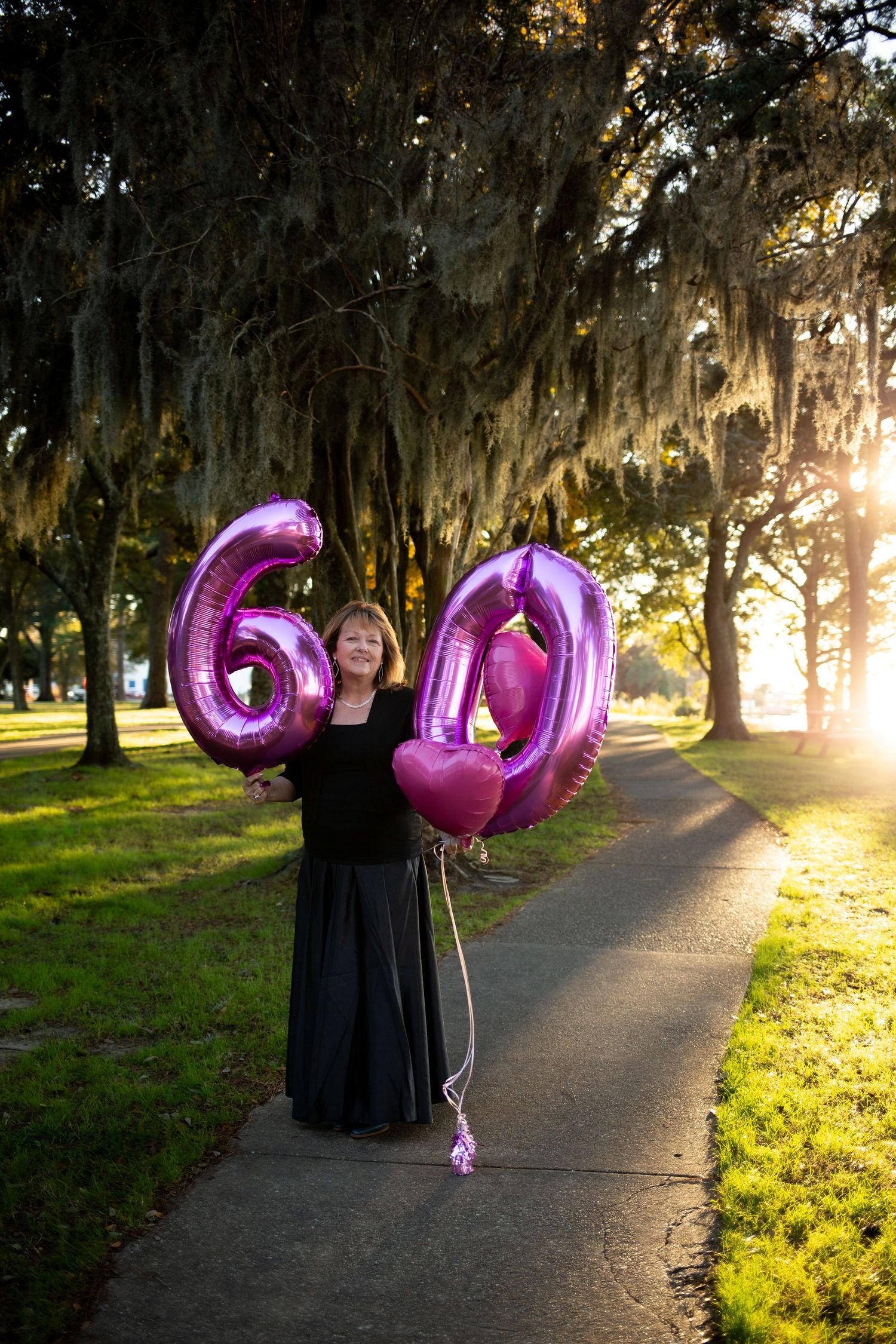 woman  with birthday balloons