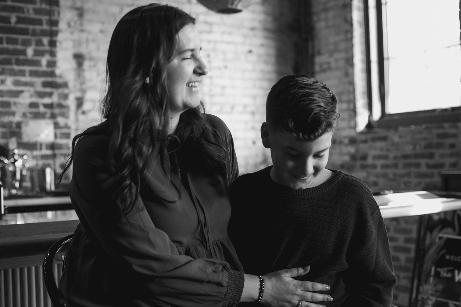 mother and son laughing