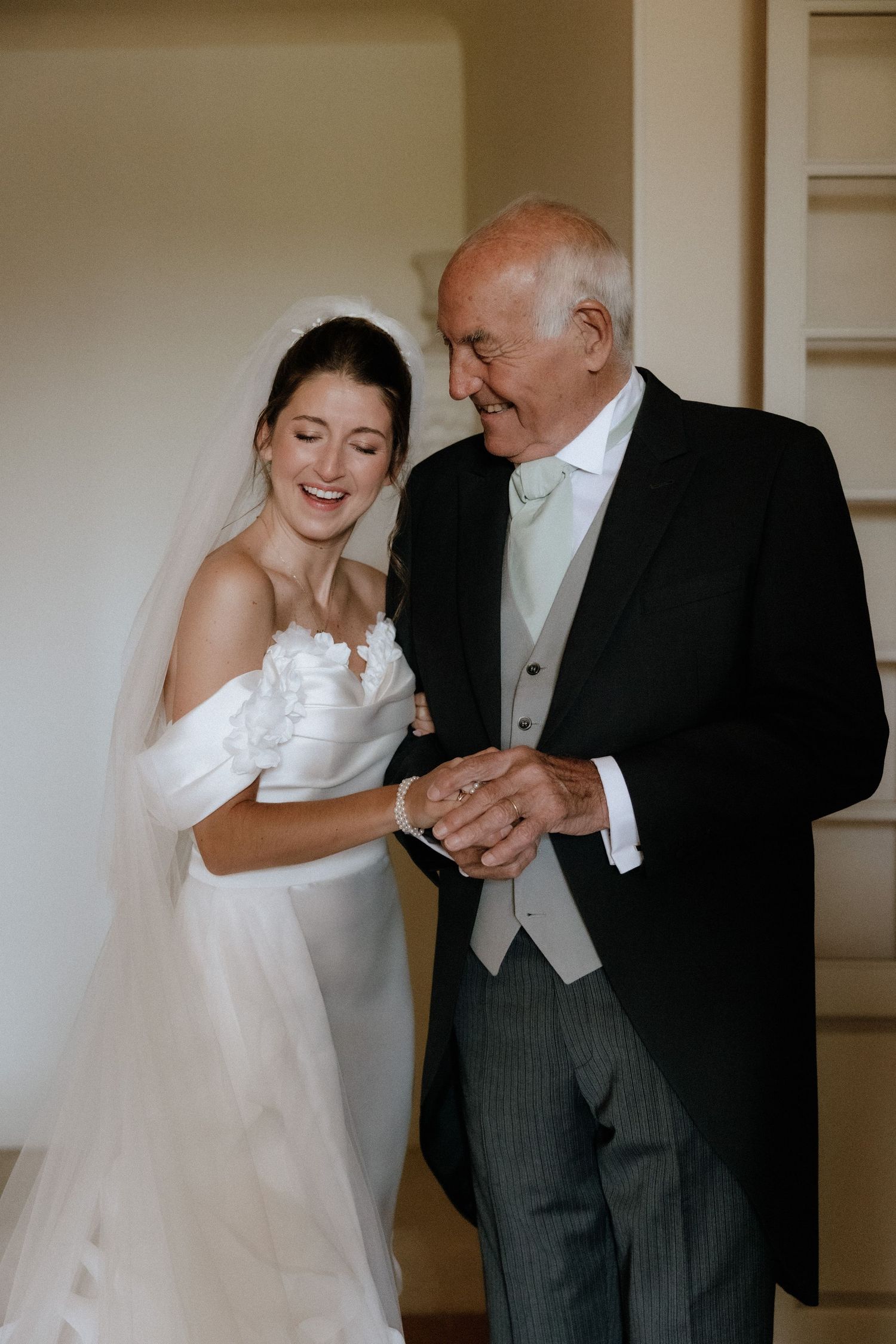 A sequence of intimate wedding moments between a bride and an elderly gentleman.