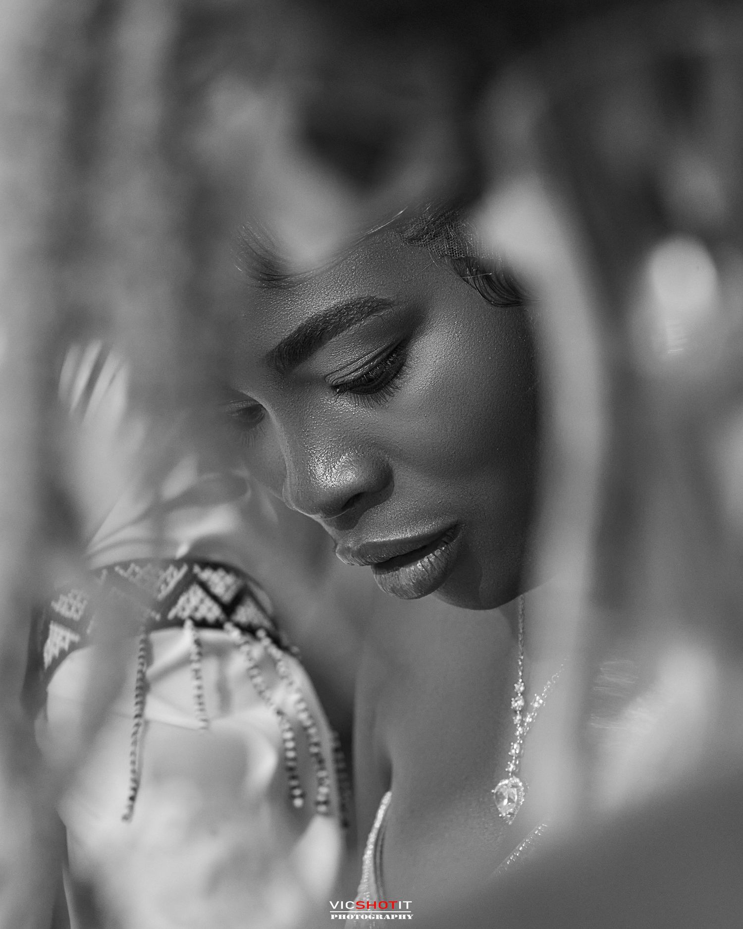 Black and white portrait series showing elegant jewelry and makeup details.