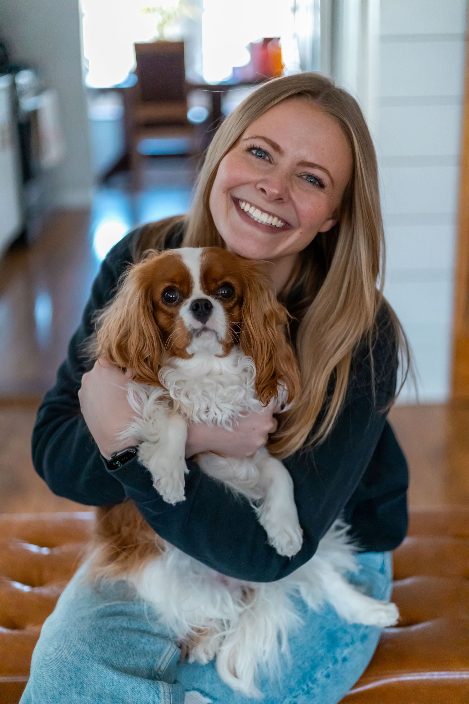 Madison holding her dog