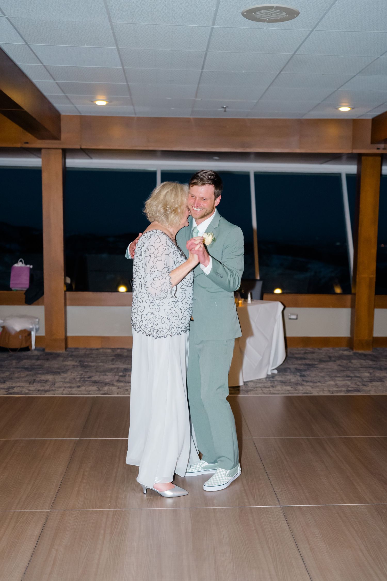 son and mom dancing at his wedding