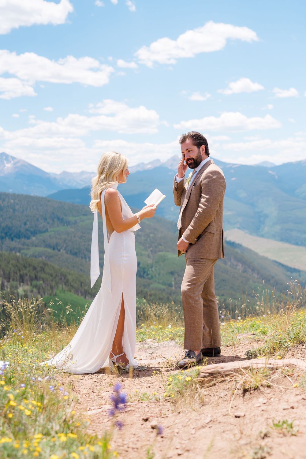 Bride reads vows to emotional groom at their Aspen wedding