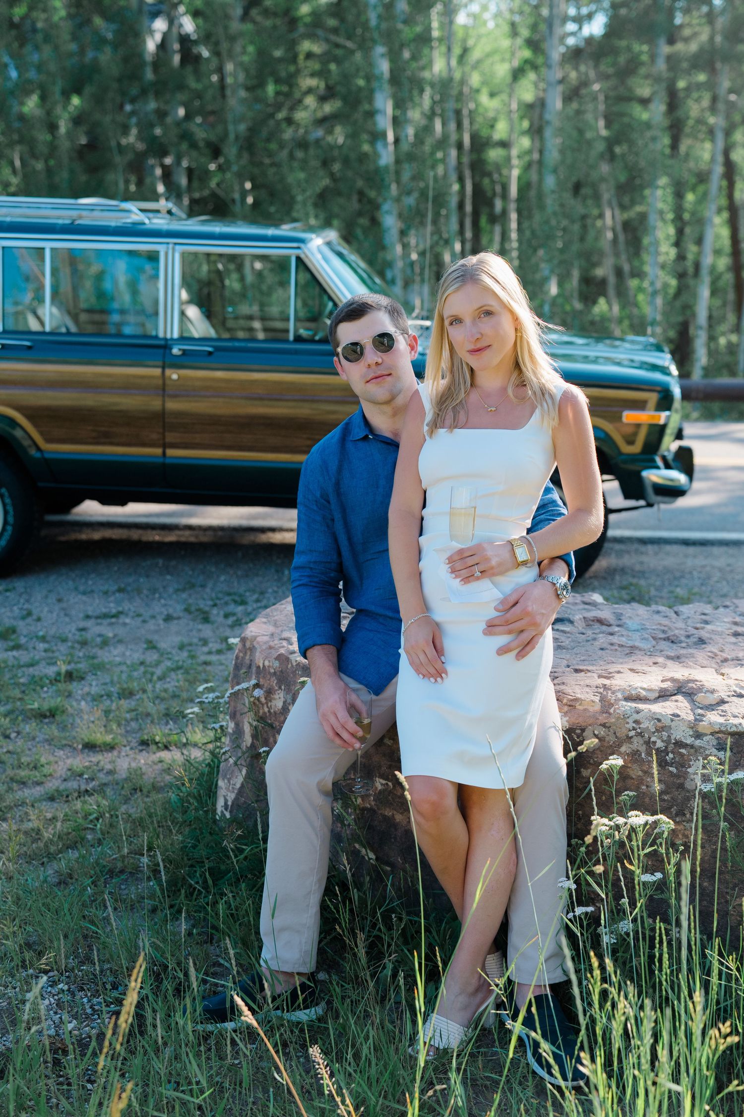 guy and girl looking at me with car in background