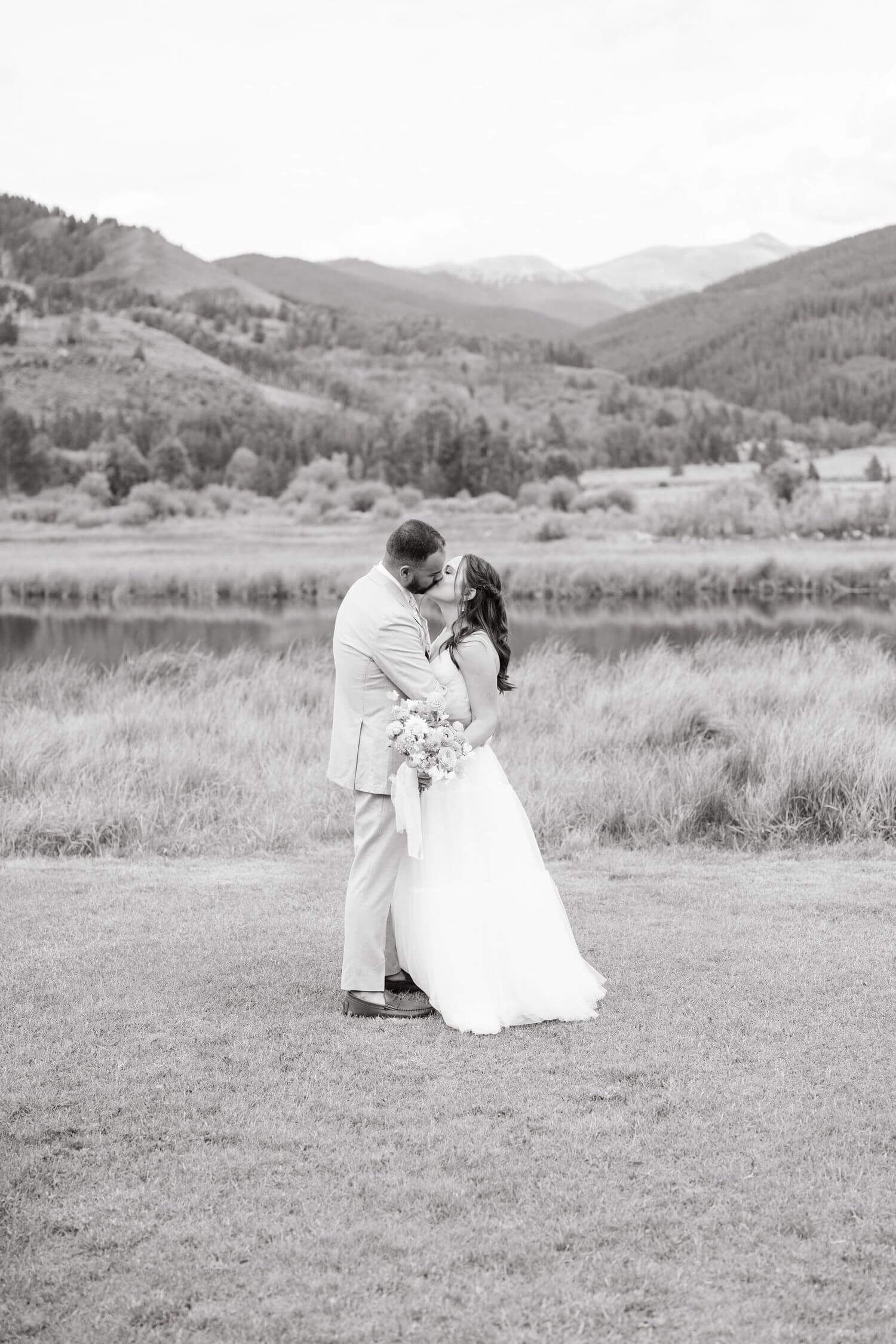 Camp Hale Wedding Black and white wedding photos captured in a serene mountain meadow setting.