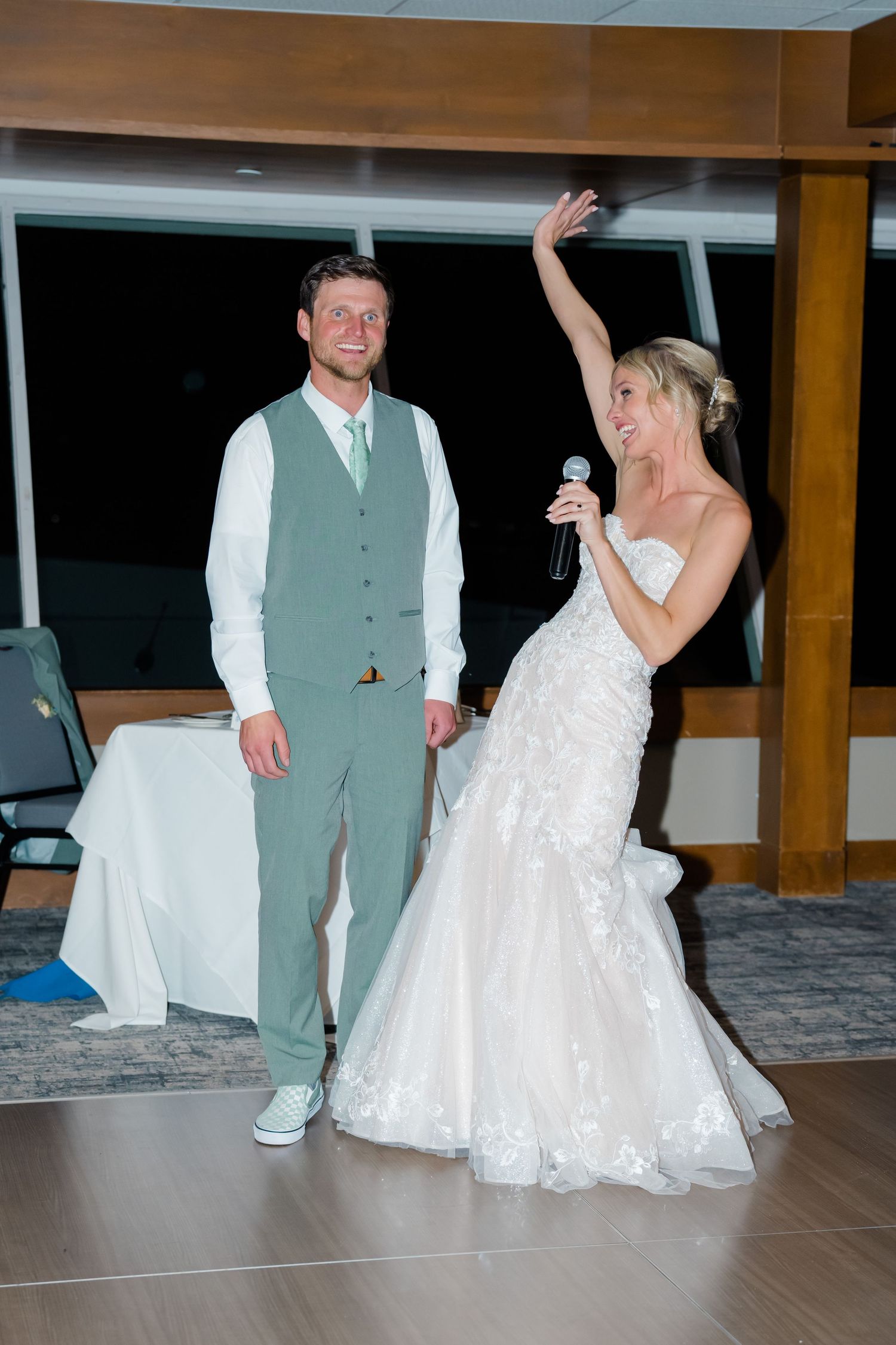 couple celebrating at wedding reception