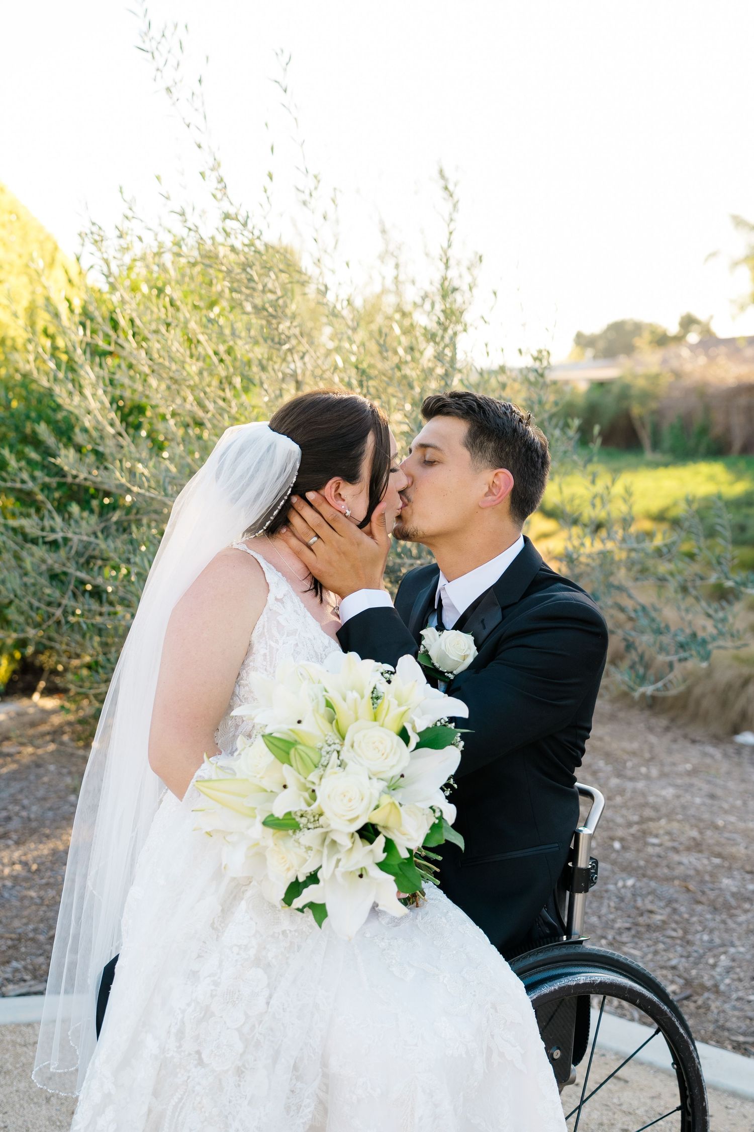 Amber and Neven Hart during outdoor portraits at their Canopy Grove wedding in Escondido, California, photographed by Sierra Sturt Photo.