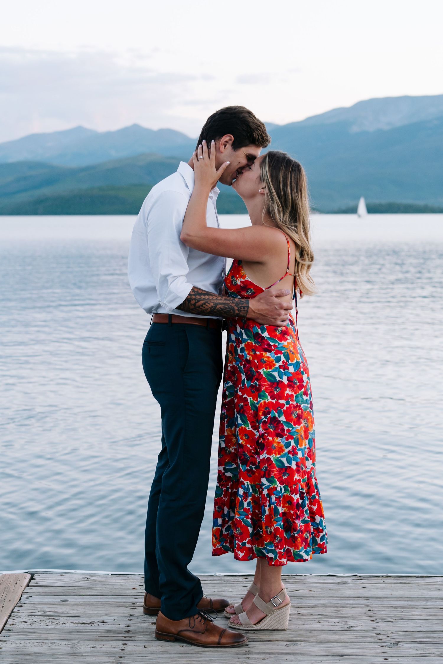 guy and girl getting engaged