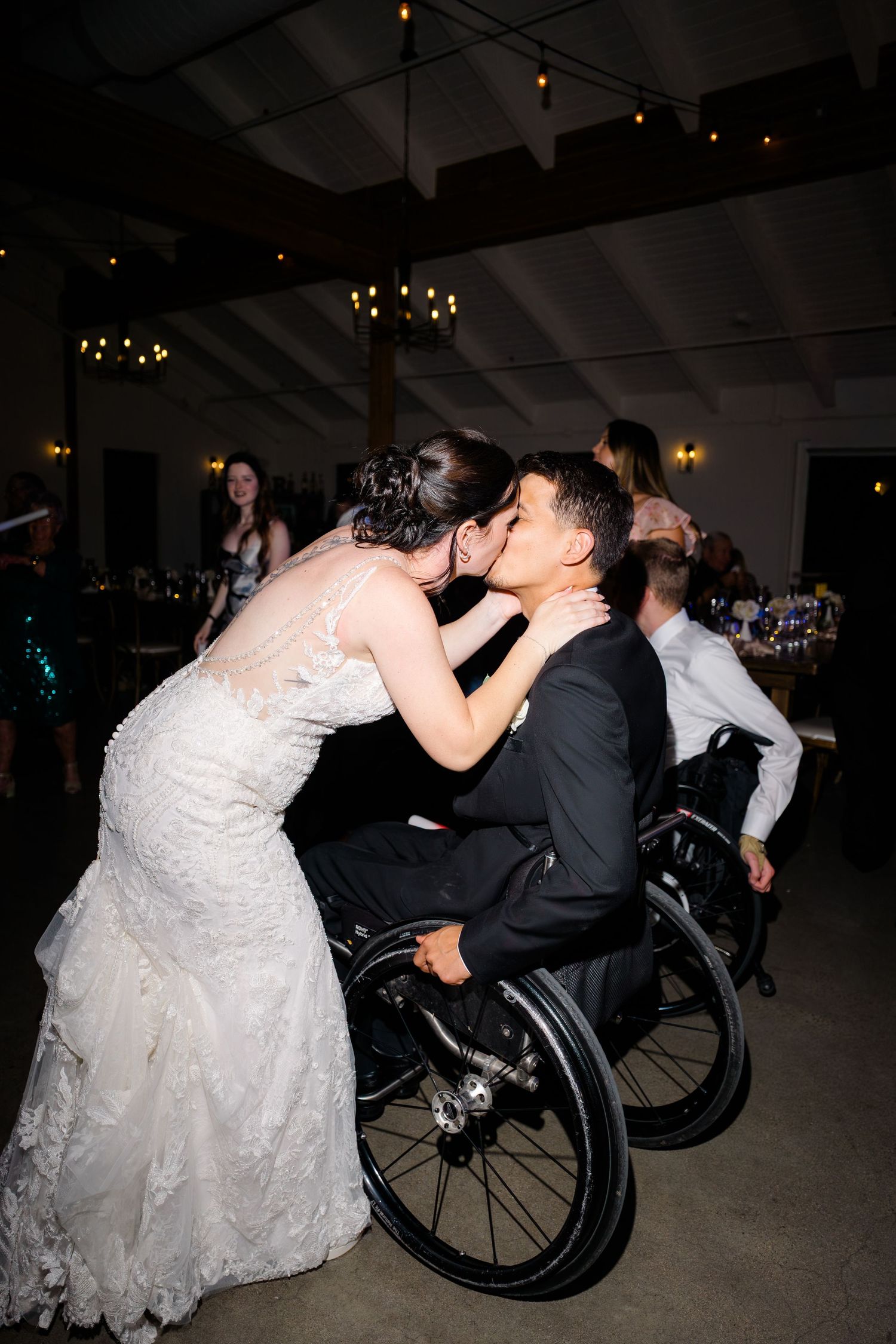 Amber and Neven Hart share a dance at their wedding reception at Canopy Grove in Escondido, California, photographed by Sierra Sturt Photo.