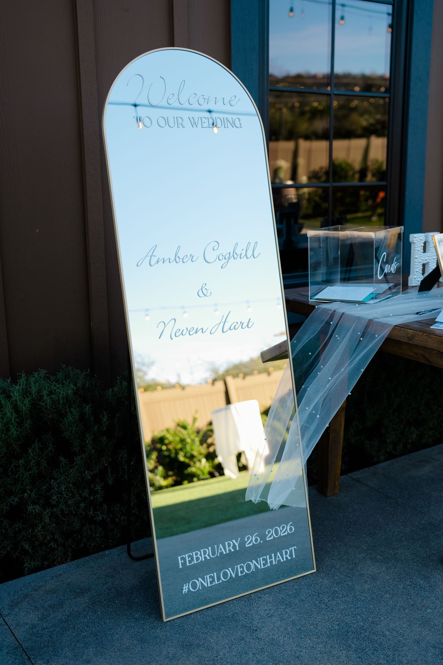 Wedding welcome sign for Amber and Neven Hart, February 26, 2026 at Canopy Grove in Escondido, California, photographed by Sierra Sturt Phot