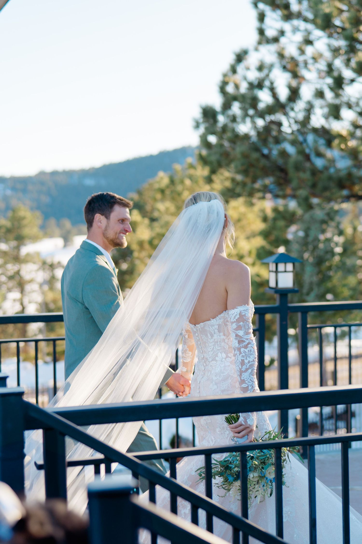 couple kissing and walking out of wedding