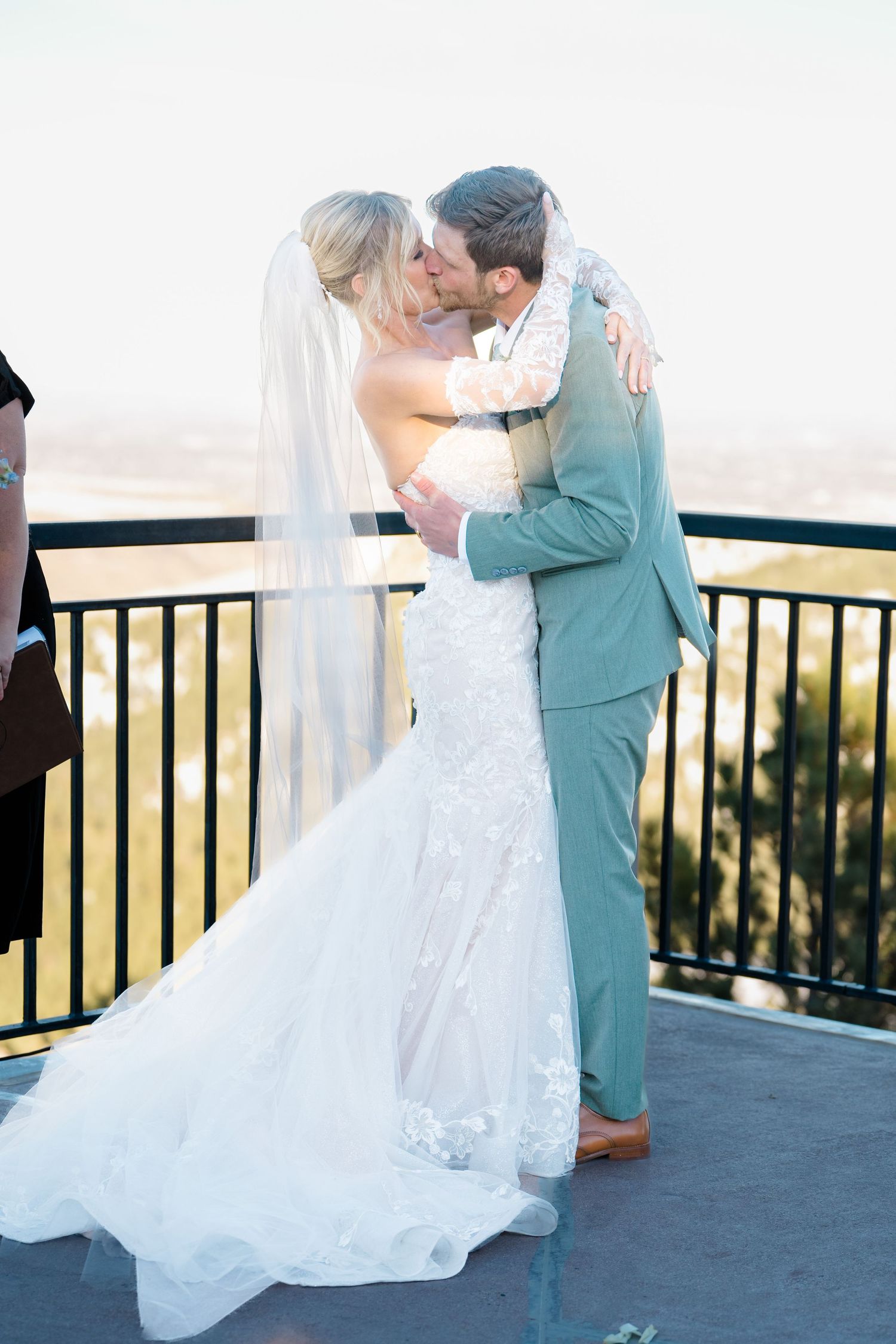 couple first kiss at wedding