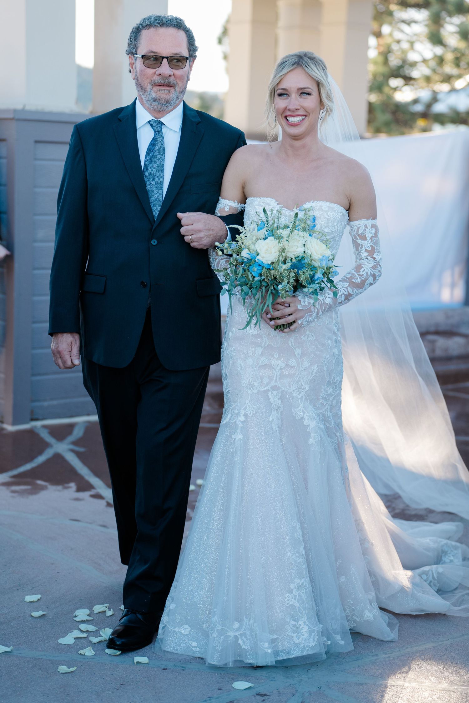 bride and father walking down the aisle