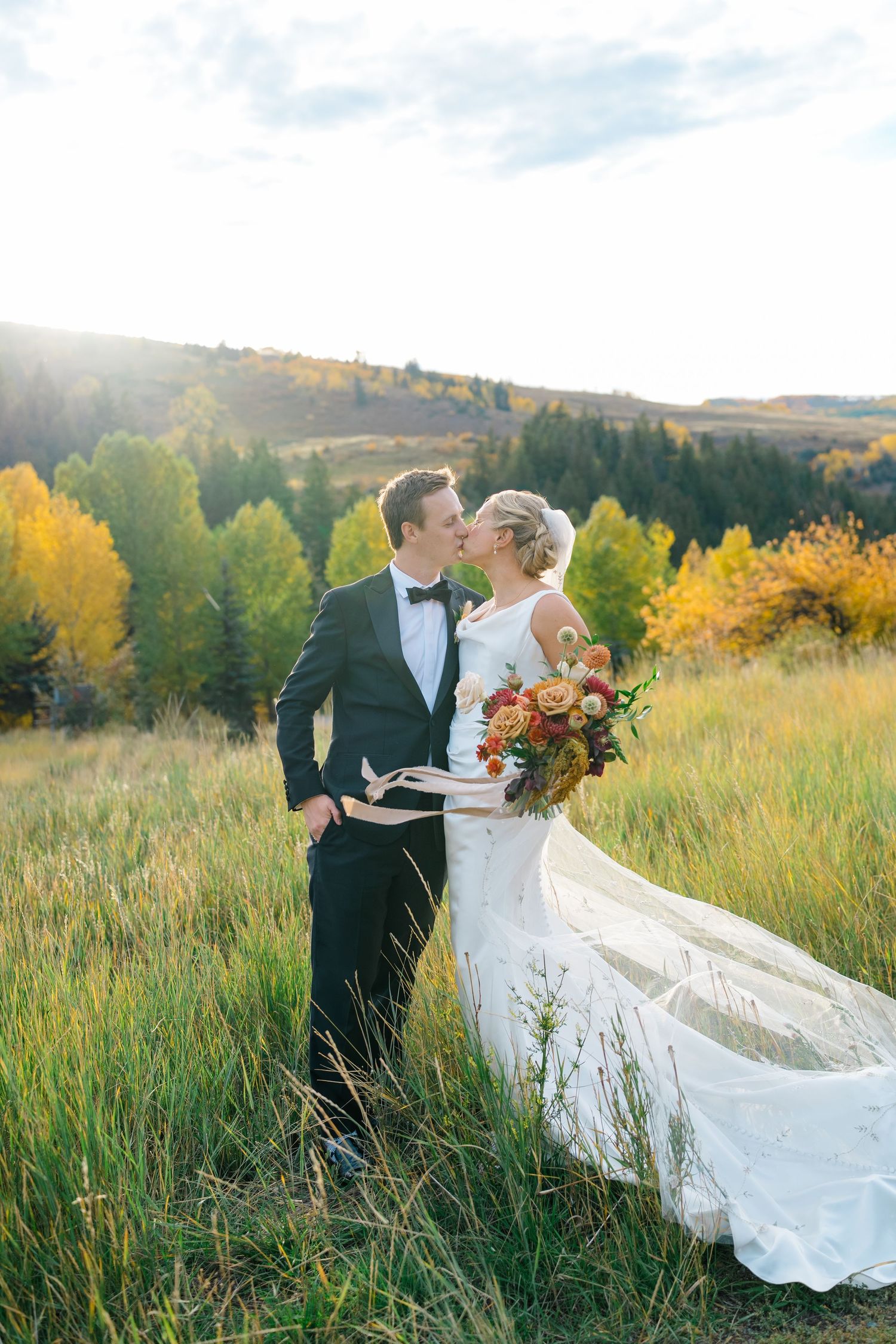 minturn colorado wedding in a field with bride and groom