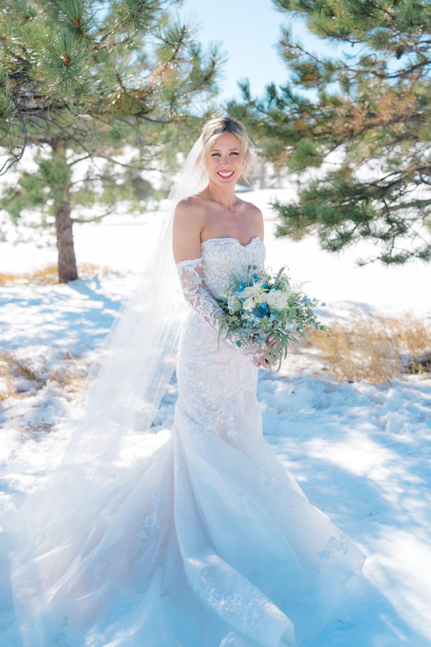 bride looking down at flowers